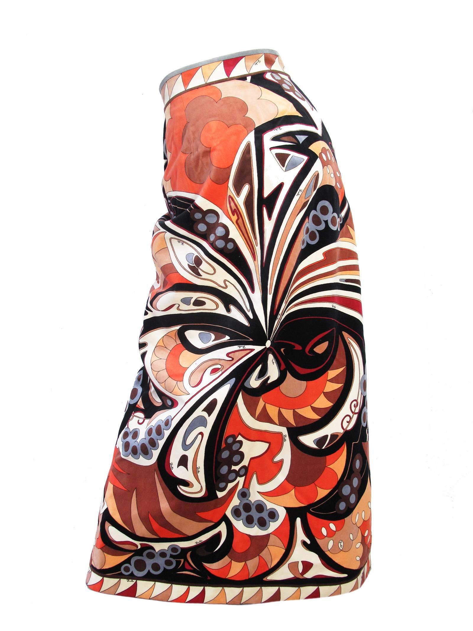 1970s Pucci velvet geometric printed skirt with zipper down front.  Condition: Good, a few spots, see photos.  Label size 10 but fits current size US 6

We accept returns for refund, please see our terms.  We offer free ground shipping within the