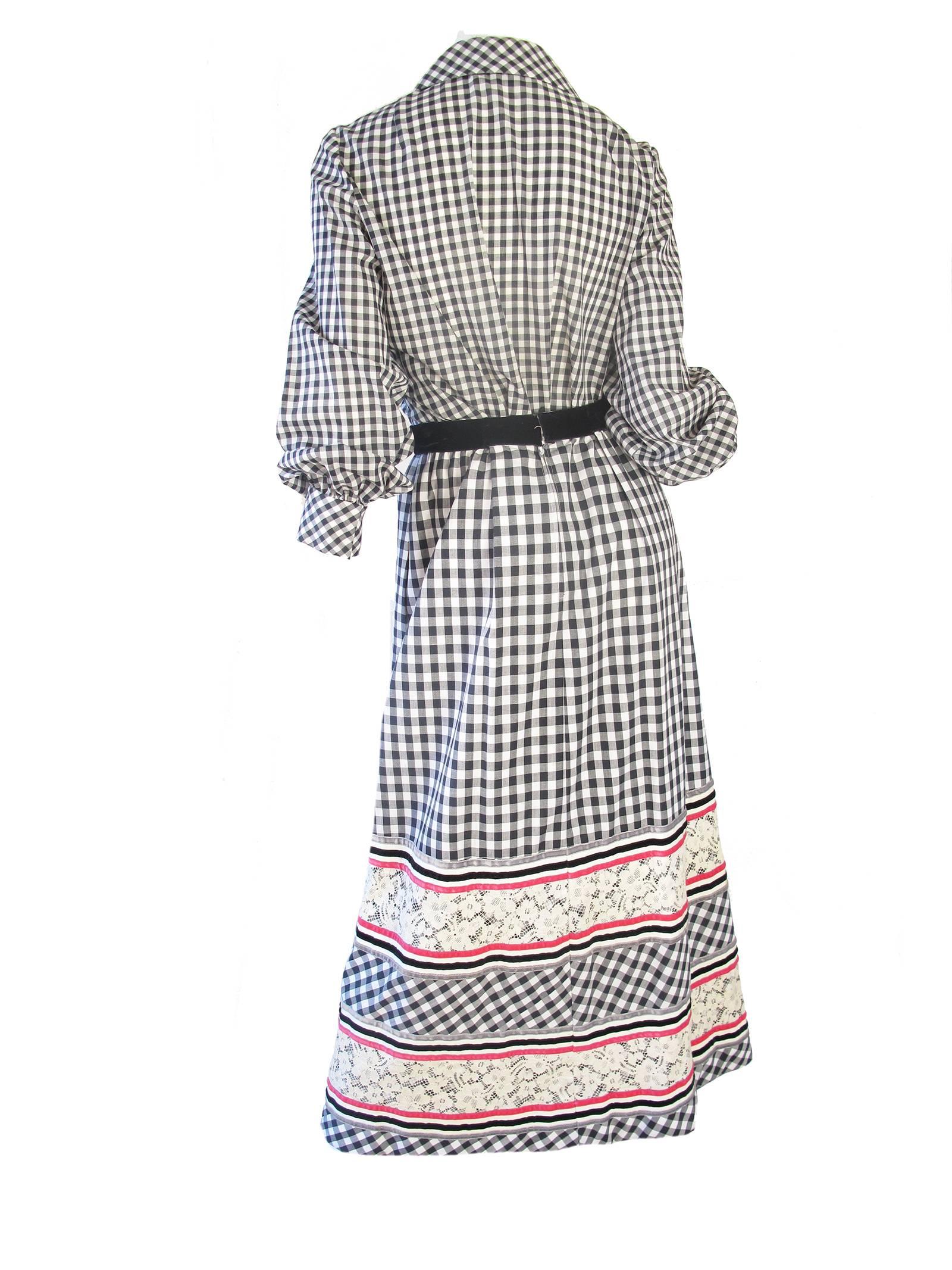 1970s Malcolm Starr black and white gingham cotton blouse and skirt with lace and velvet.  Condition: Very good, small spot on lace, see photos.  
Size 8 

We accept returns for refund, please see our terms.  We offer free ground shipping within the