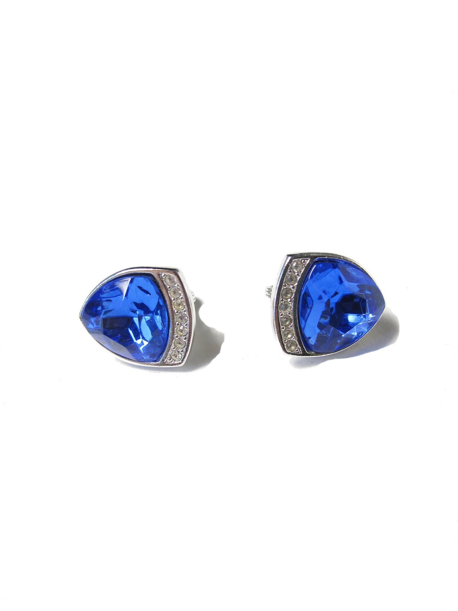 1980s Yves Saint Laurent blue glass and rhinestone clip on earrings.  
We accept returns for refund, please see our terms.  We offer free ground shipping within the US. 