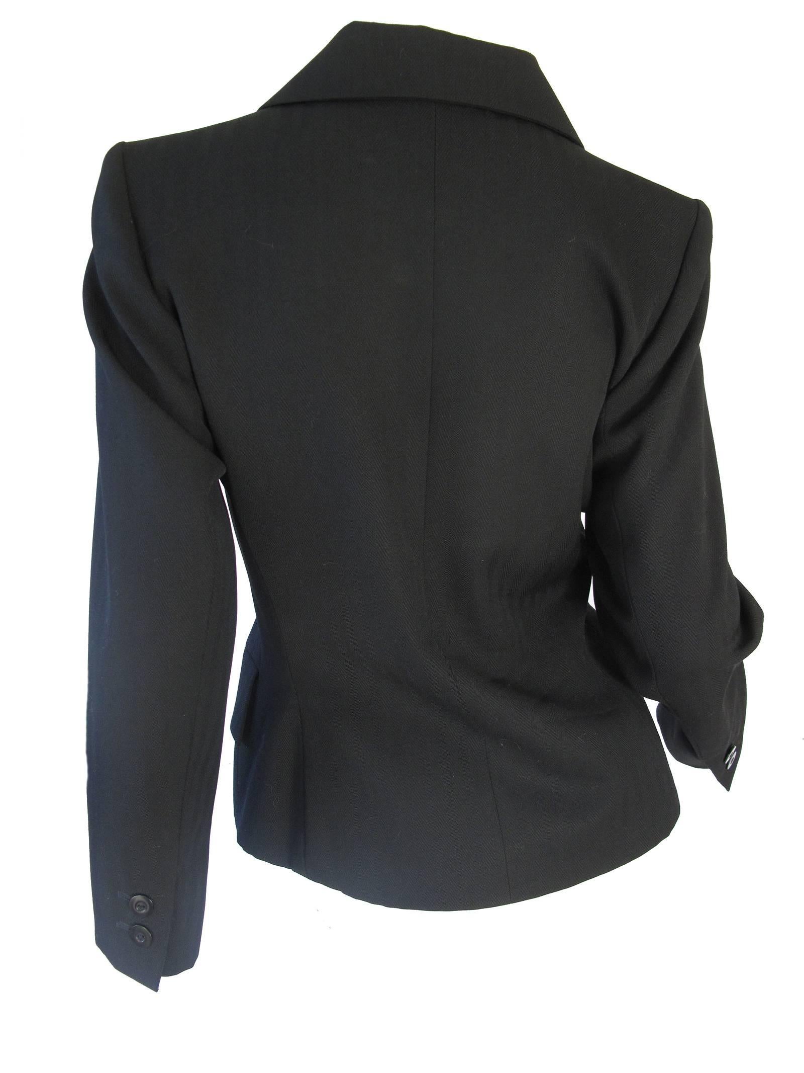 Yves Saint Laurent Rive Gauche black wool gabardine jacket.  Notched collar, buttons down front. Condition: Excellent. Two front pockets, uncut.  Size 38 / US 6

We accept returns for refund, please see our terms. We offer free ground shipping