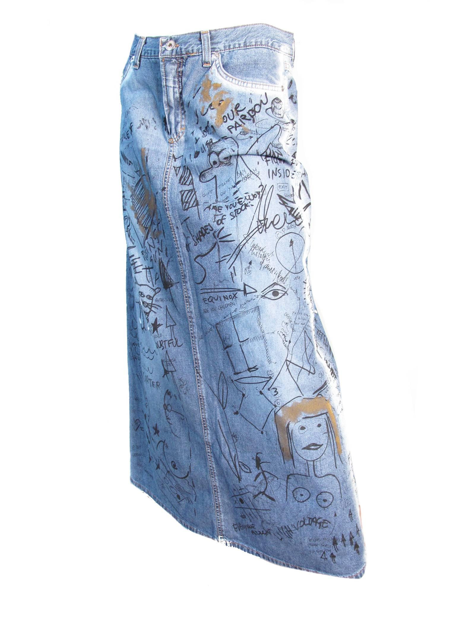 D & G long denim skirt with graffiti.  Condition: Excellent, original tags still attached.  Never worn. Size 42
31