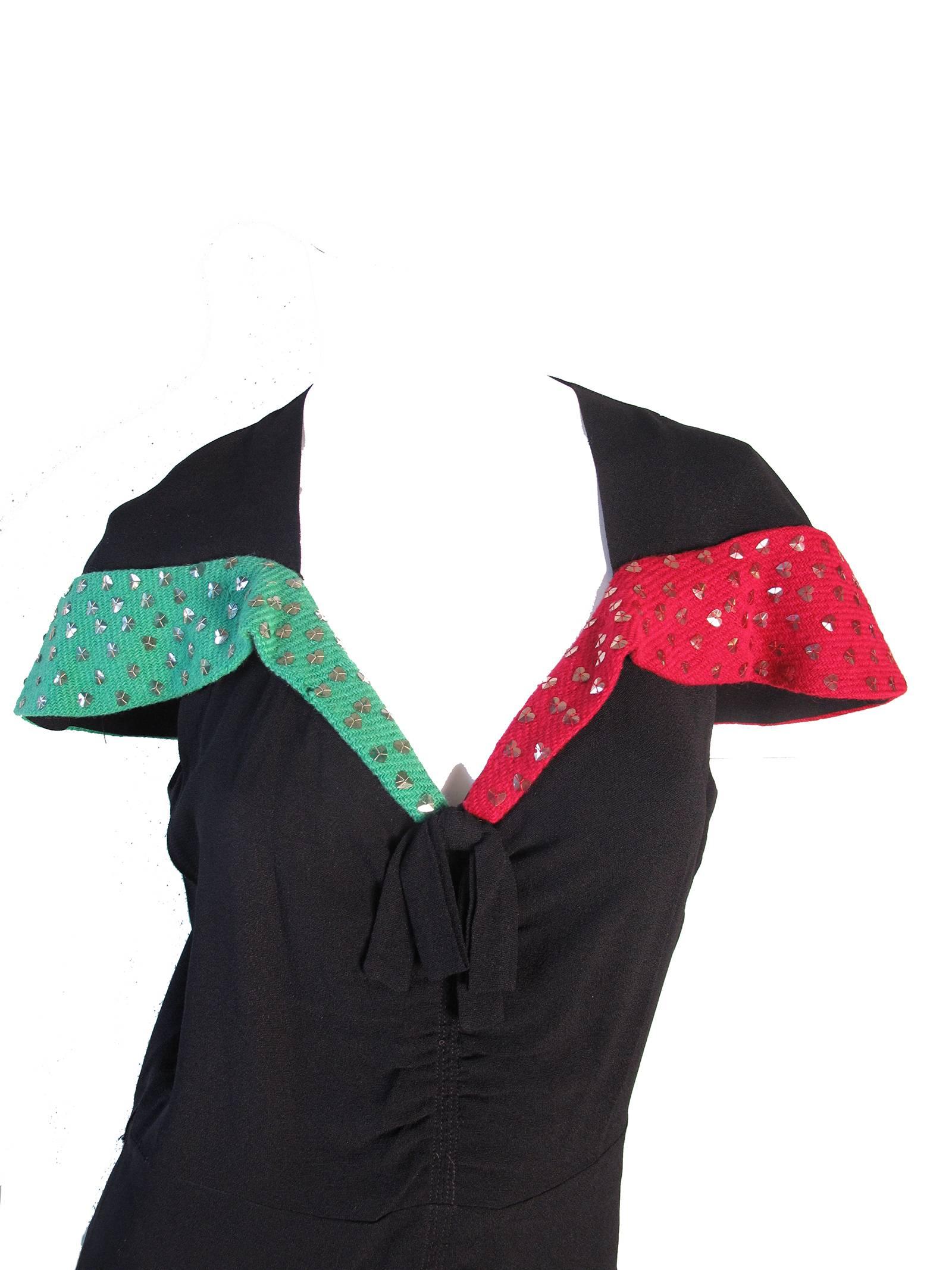 Rare 1930s Eisenberg & Sons Originals black dress with red and green trim on shoulders/ heart shaped sequins. 
36
