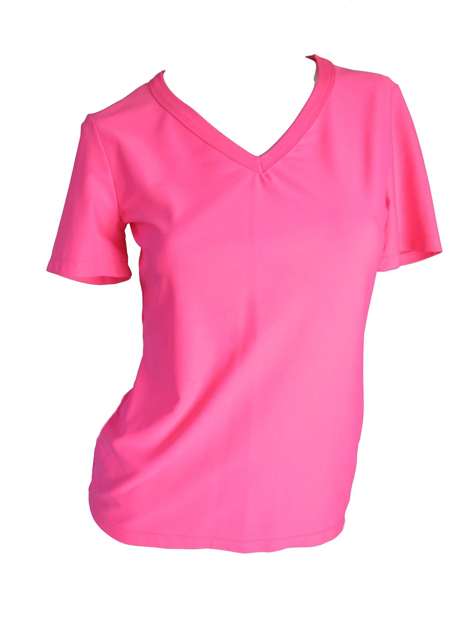 Versus neon pink tee with letters on back.  Condition: Good, some discoloration.  Nylon/spandex material.  Medium ( mannequin is a US size 6)
We accept returns for refund, please see our terms.  We offer free ground shipping within the US. 