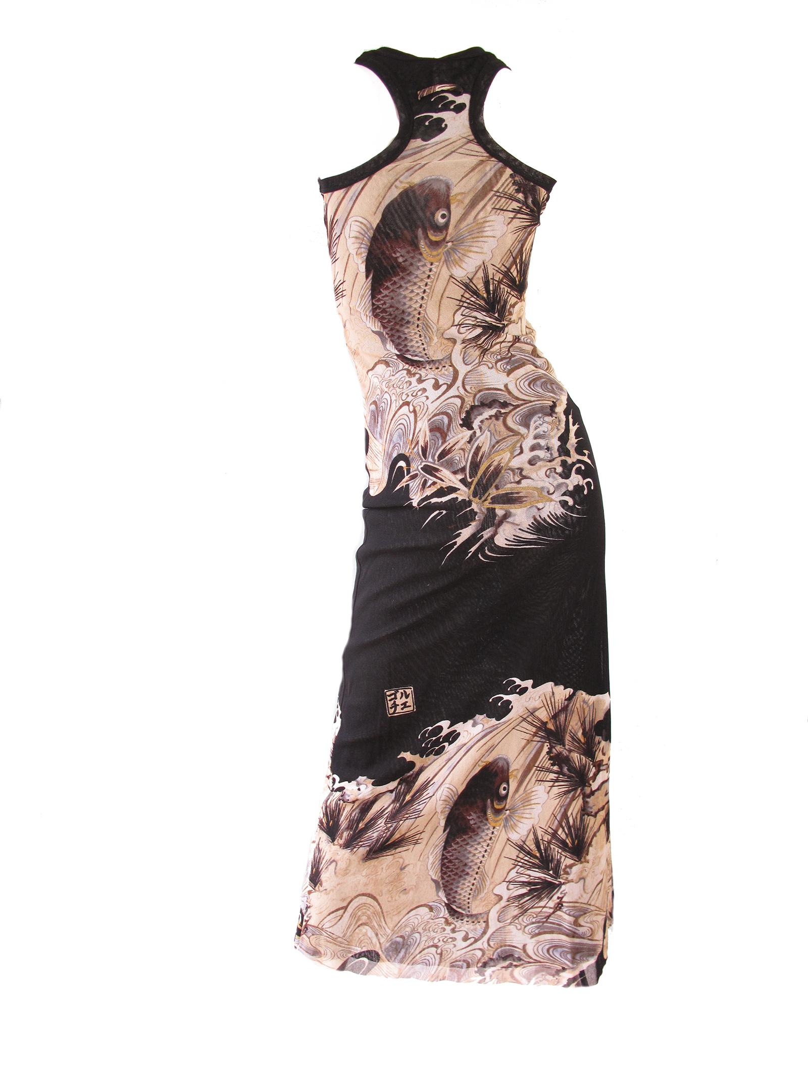 1990s Jean Paul Gaultier mesh stretch sleeveless dress with Koi print.  Condition: Excellent  Size small ( mannequin is US size 6)

We accept returns for refund, please see our terms.  We offer free ground shipping within the US.