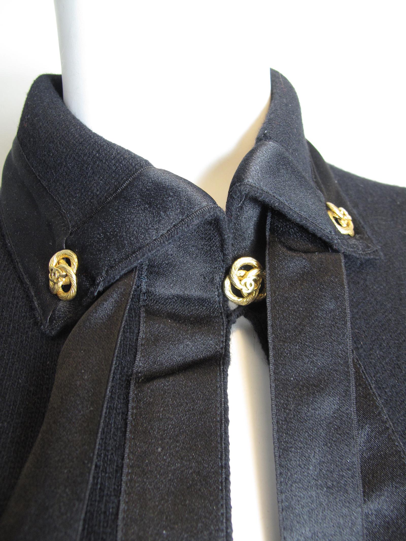 Chanel black cashmere cardigan with satin trim and necktie.  