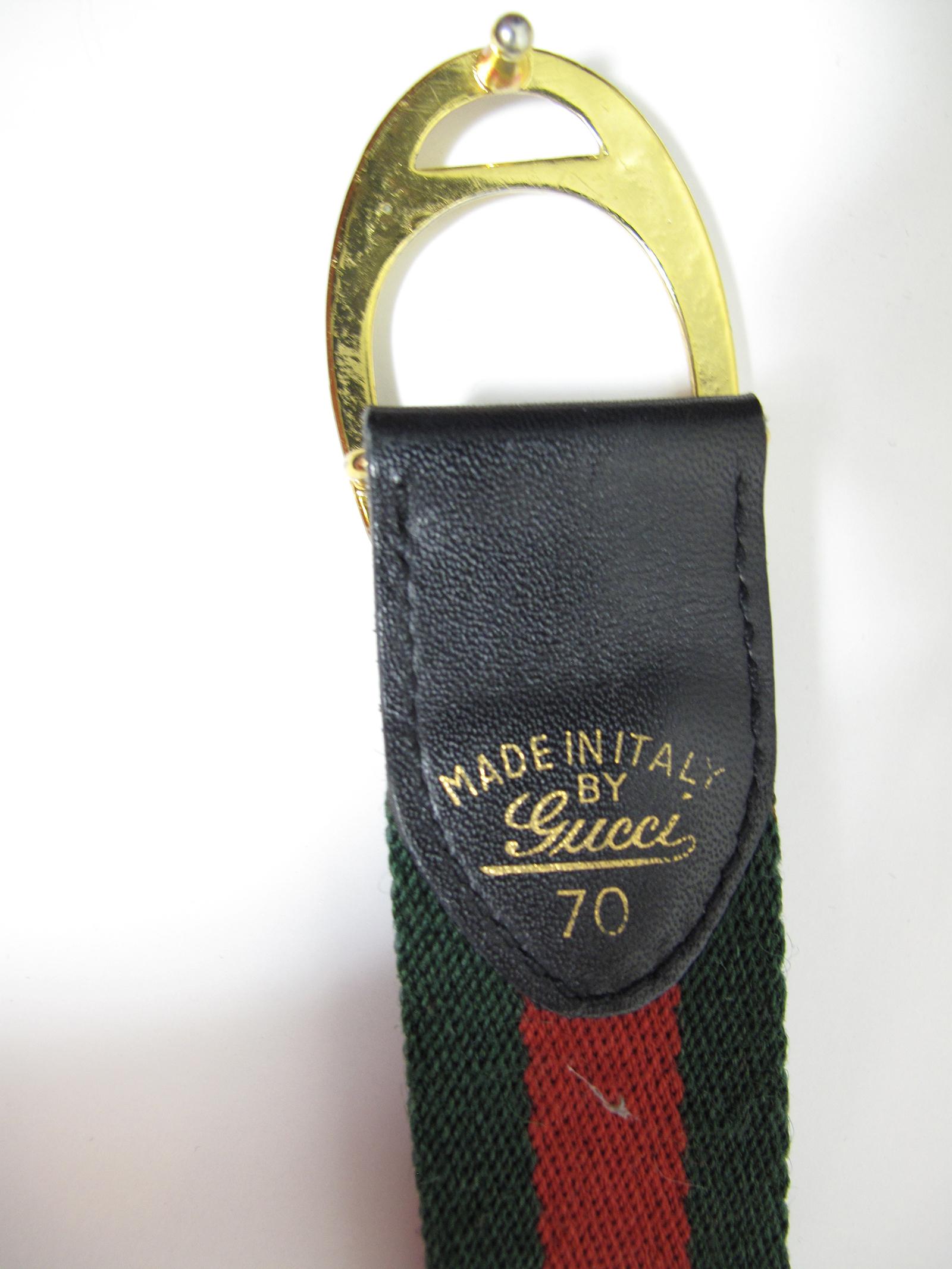 Gucci red and green striped belt.  Condition: Excellent. Stamped Gucci made in Italy. Fits 26 1/2