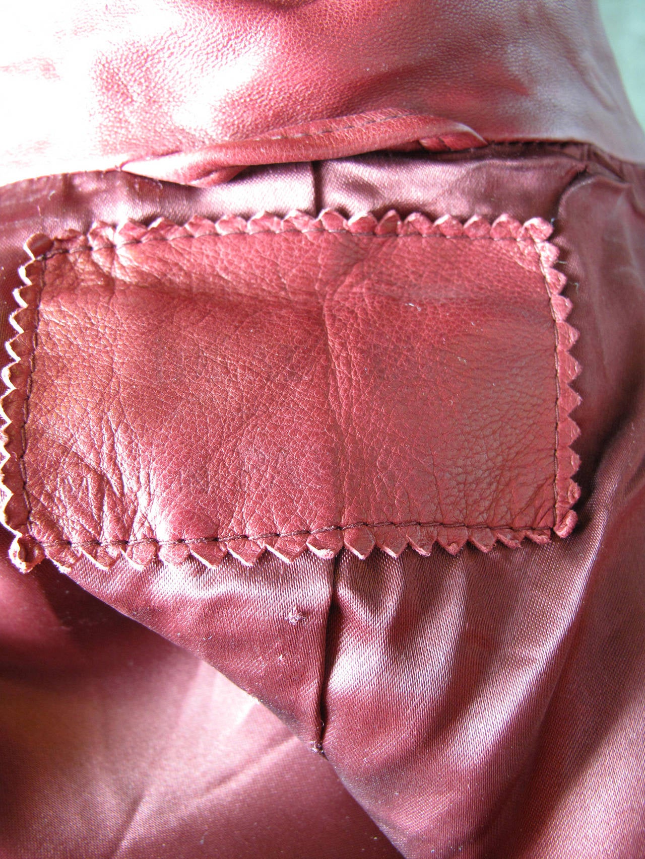 1980s Claude Montana wine colored fringe leather jacket 6