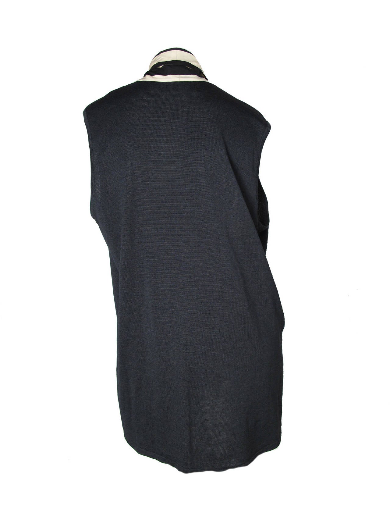 Gianfranco Ferre silk and striped sleeveless blouse with knit back.    Condition: Excellent. Size 42/ US 8