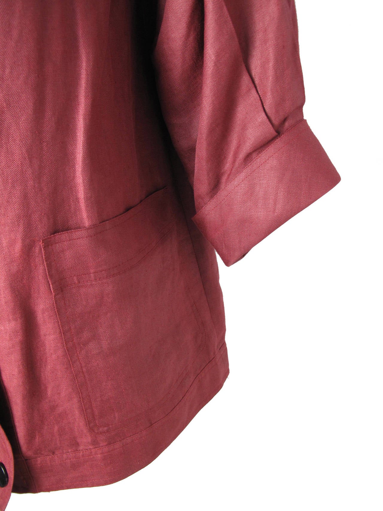 1970s Oscar de la Renta Maroon Linen Jacket.  Two large front pockets, buttons down front. 
42