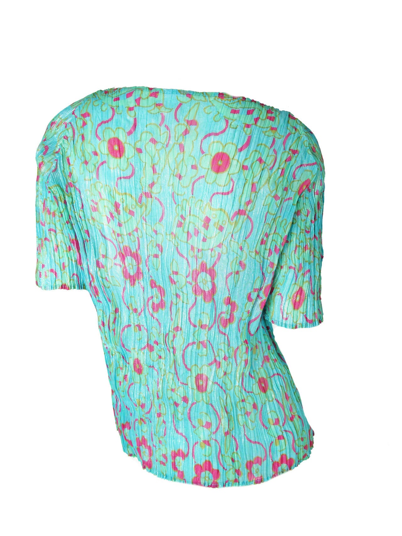 Issey Miyake blue iridescent pleated top with pink and gold floral print. 30