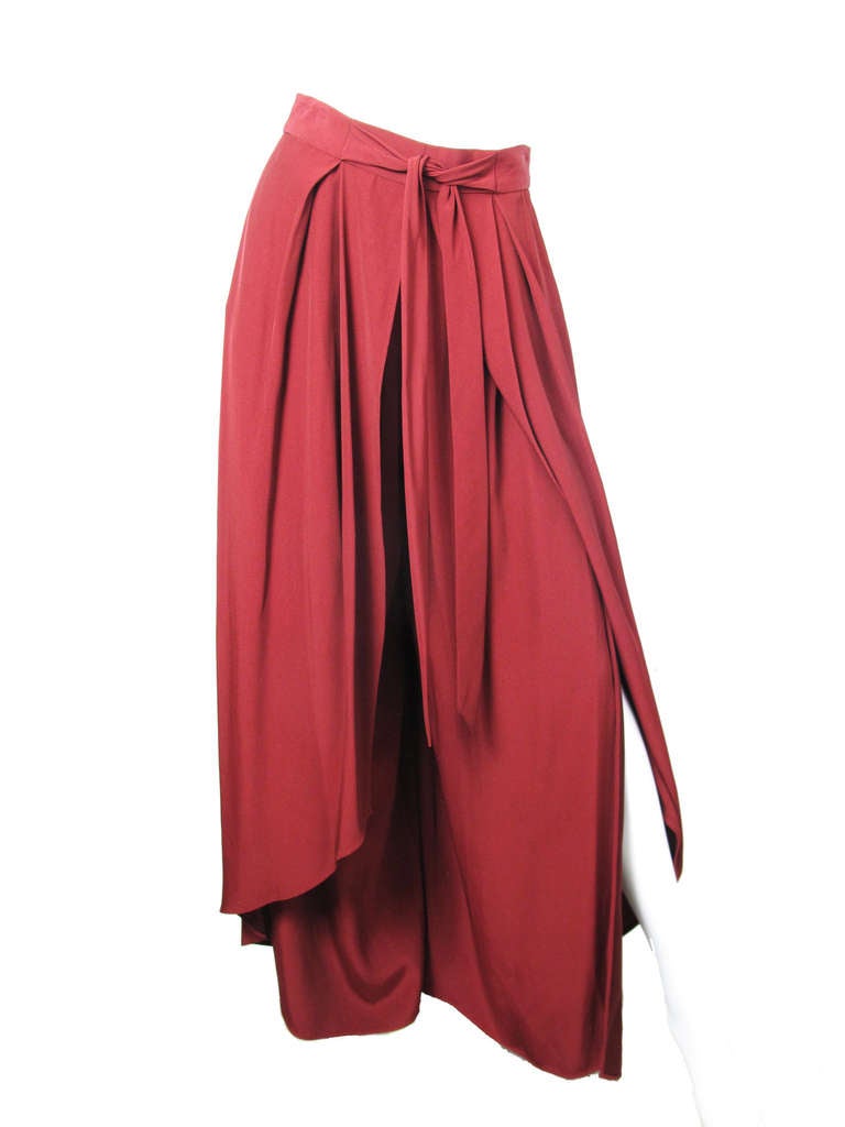 Christian Lacroix maroon pants with slits up sides.  Acetate and Rayon fabric. 28