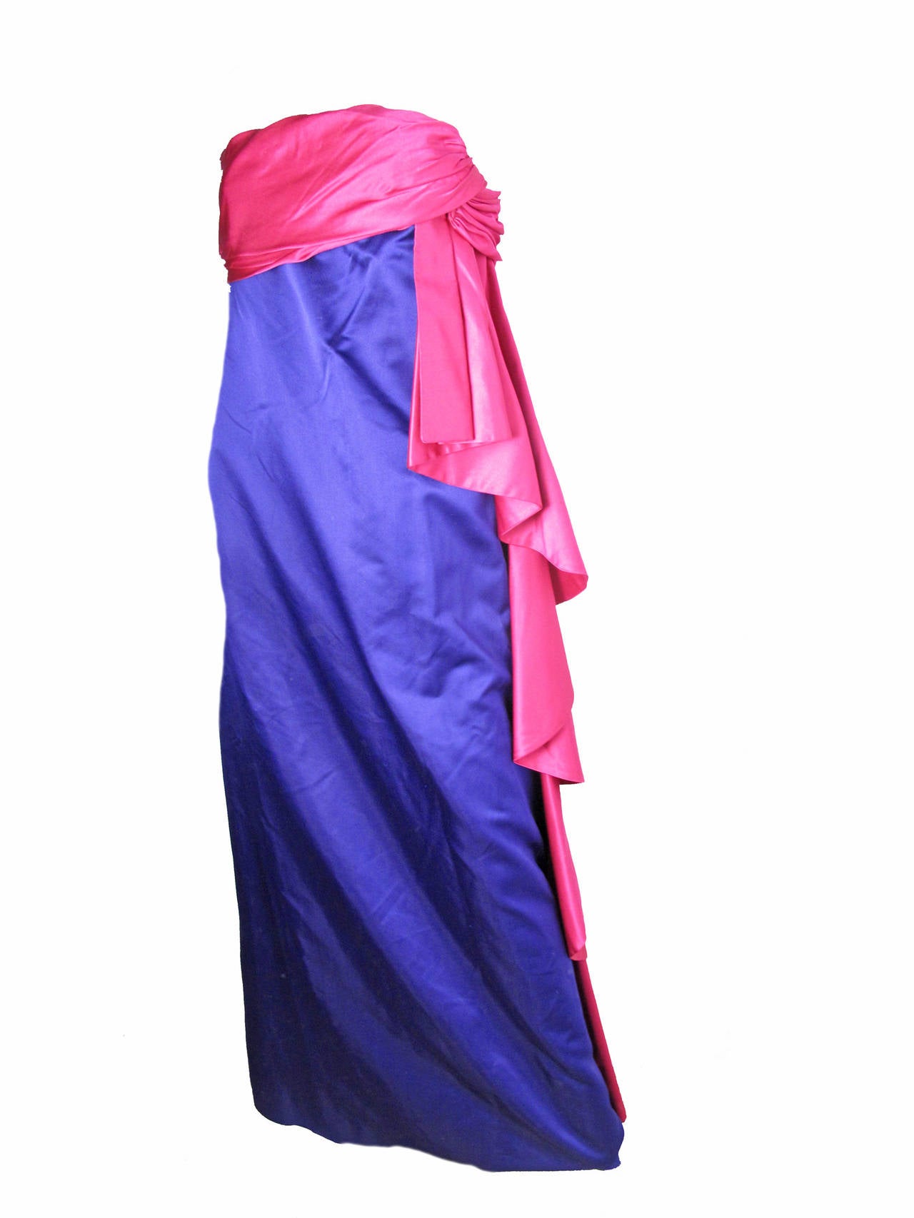Gorgeous 1970s Bill Blass purple silk satin gown with pink ruffle on side. 34
