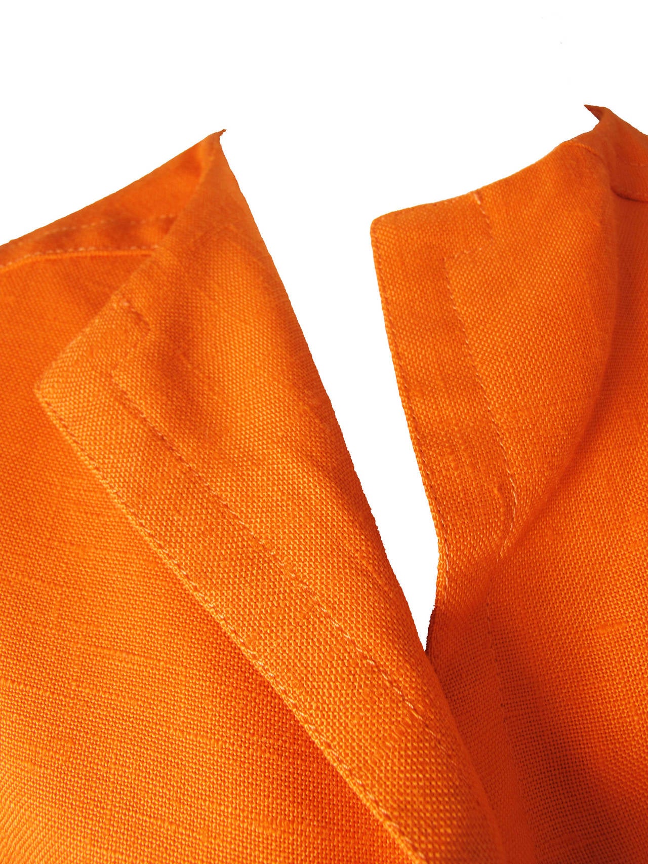 Geoffrey Beene orange linen jacket with two front pockets.  36