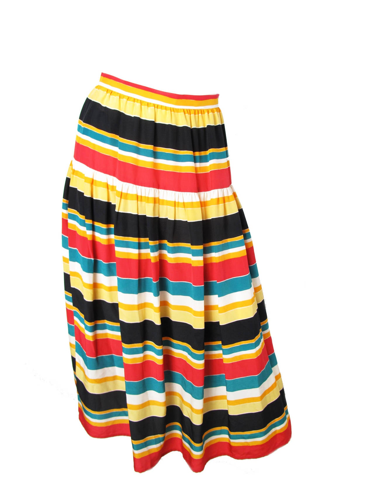Oscar de la Renta silk striped skirt with cotton peasant blouse.  

Skirt: 25