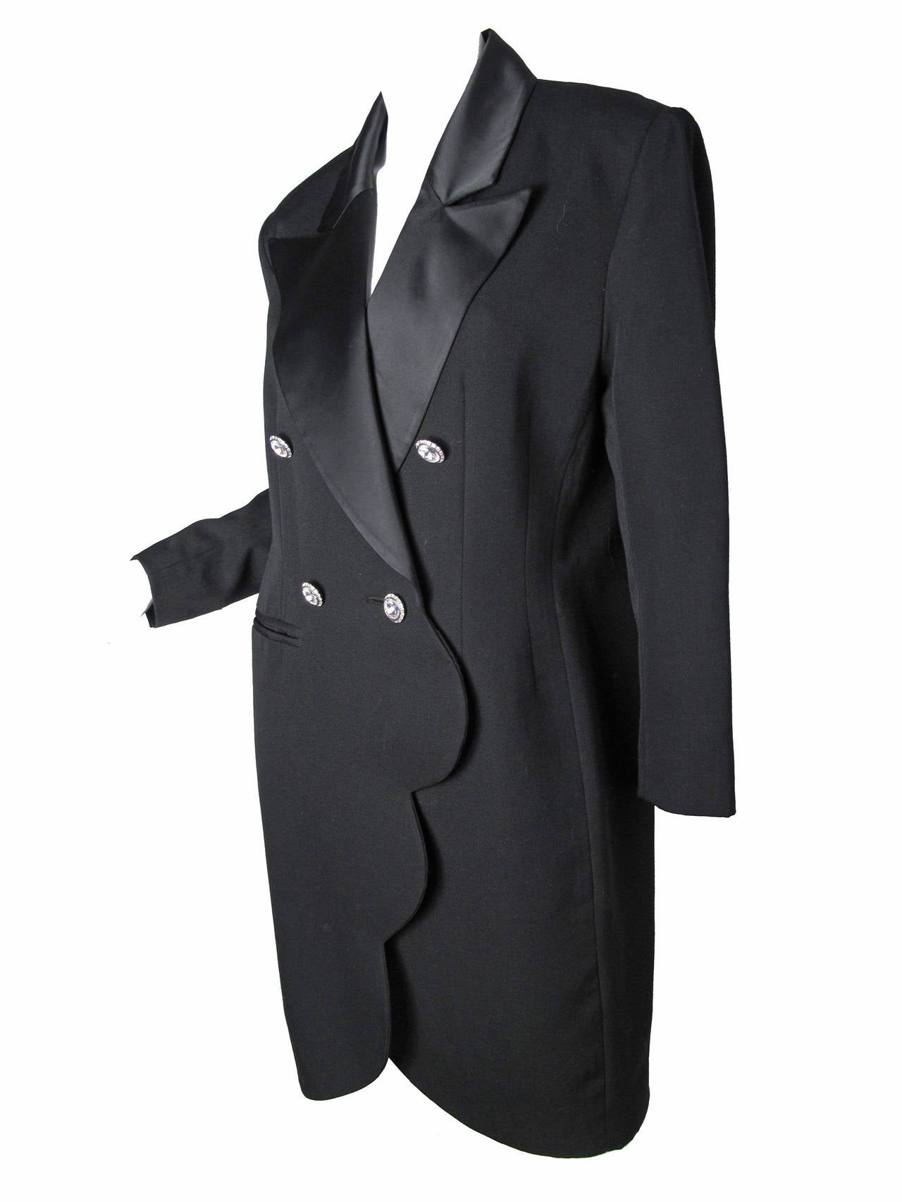 1980s / early 90s Guy Laroche black wool tuxedo dress / jacket with rhinestone buttons on front and cuffs. Scalloped edge, One front pocket , uncut.  38