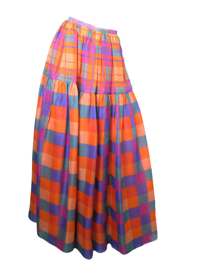 Unsigned Oscar de la Renta colorful sheer plaid evening skirt and blouse.  Cuffs and collar are removable.  Condition: Very good. 
skirt: 28