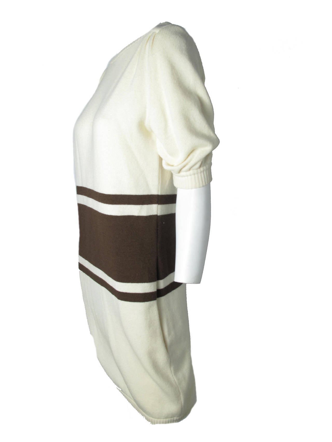 1980s Valentino creme wool dress with brown stripes and pockets. 39" bust, 35" waist, 35" hips, 13" sleeve, 34 1/2" length.  Made in Italy. Condition: Excellent. Size Med/ Large