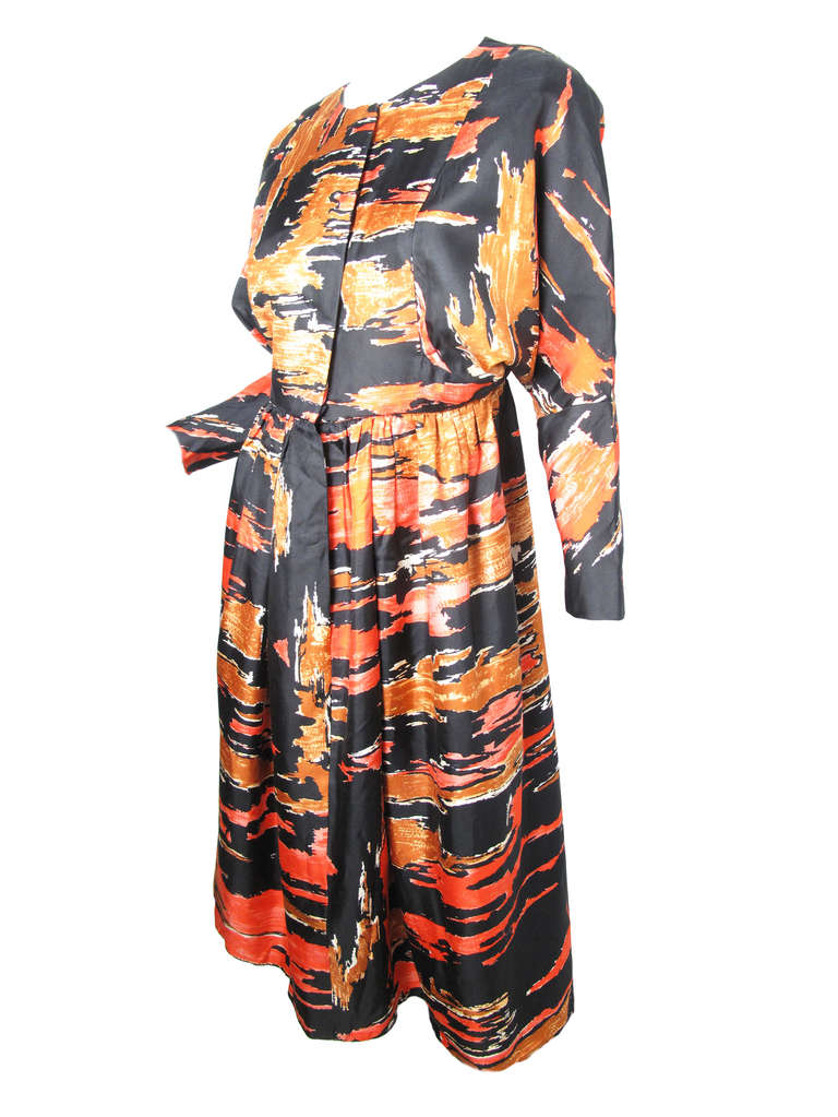 Gorgeous 1960s Galanos silk printed dress.  Orange, peach, black and white abstract print.   35
