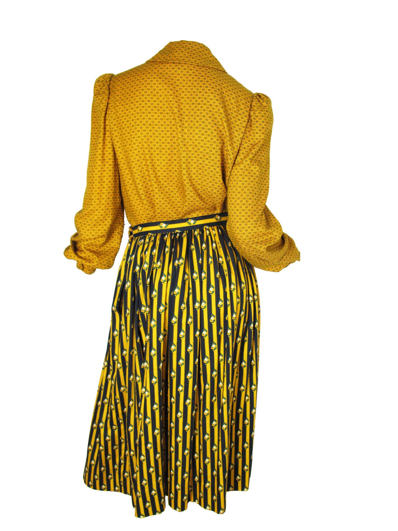 Yellow Oscar de la Renta blouse and floral skirt