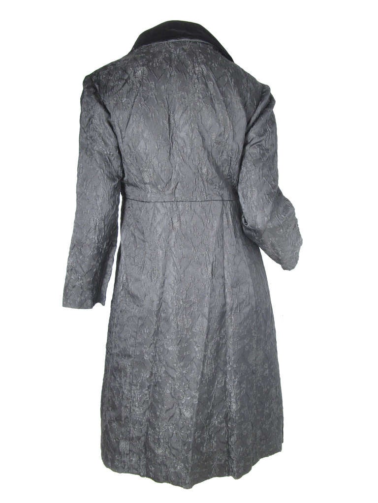 Early Louis Feraud black silk cocktail dress and coat.  Silk coat with velvet collar and buttons. Condition: Excellent.
Dress: 34" bust, 30" waist, 39" length.
Coat: 36" bust, 32" waist, 21.5" sleeve, 16.5"