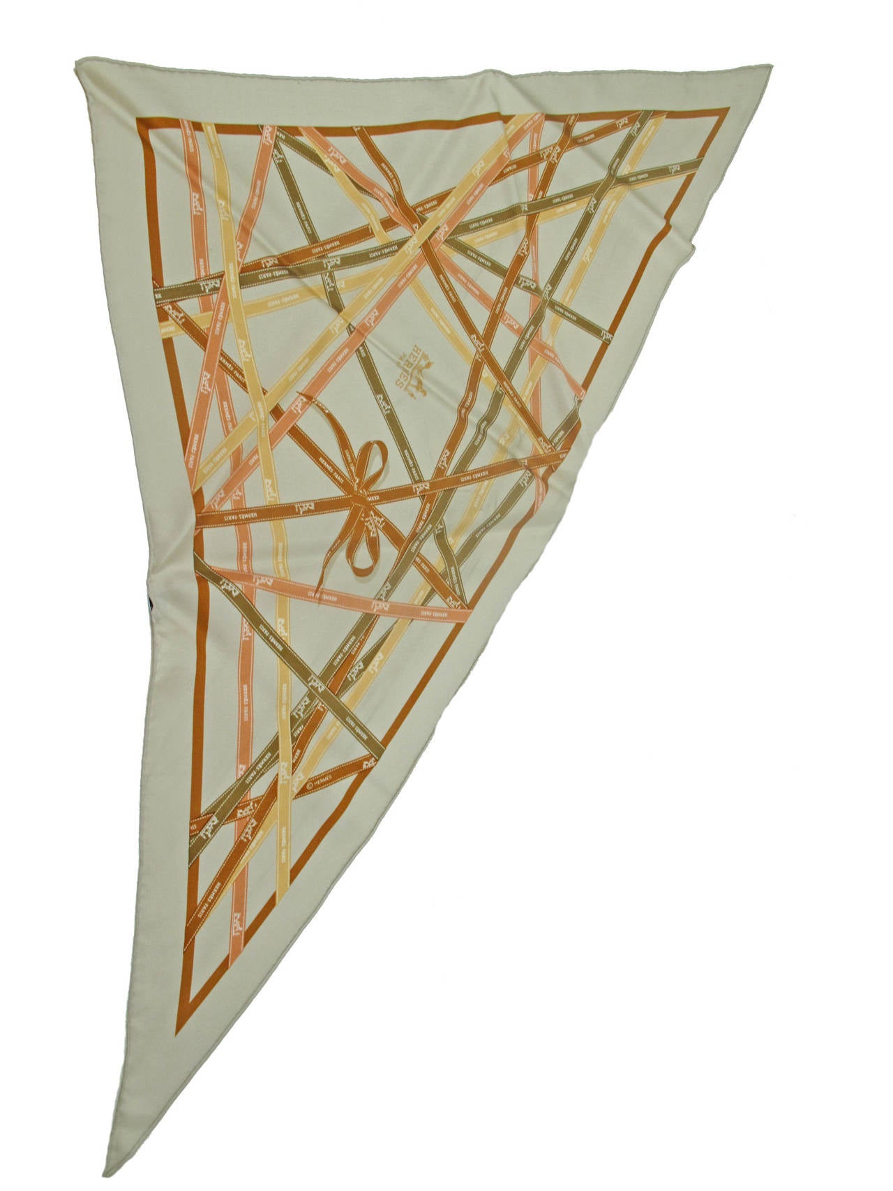 Hermes Bolduc Print Beige Silk Twill Triangle Scarf . 
Condition: Good, small spot and some dark discoloration. 

41