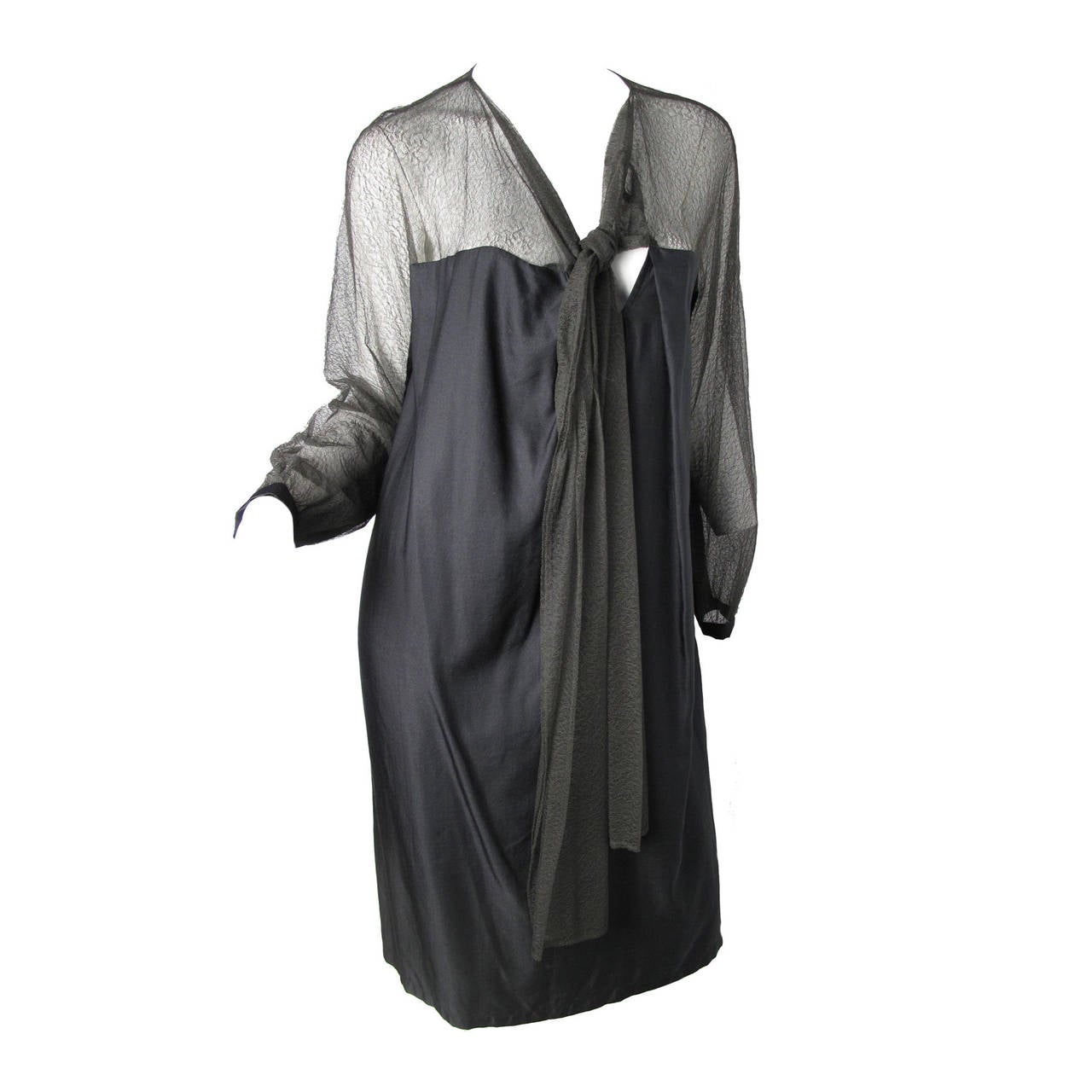 Dries Van Noten black silk dress with green lace sleeves and tie at 1stDibs