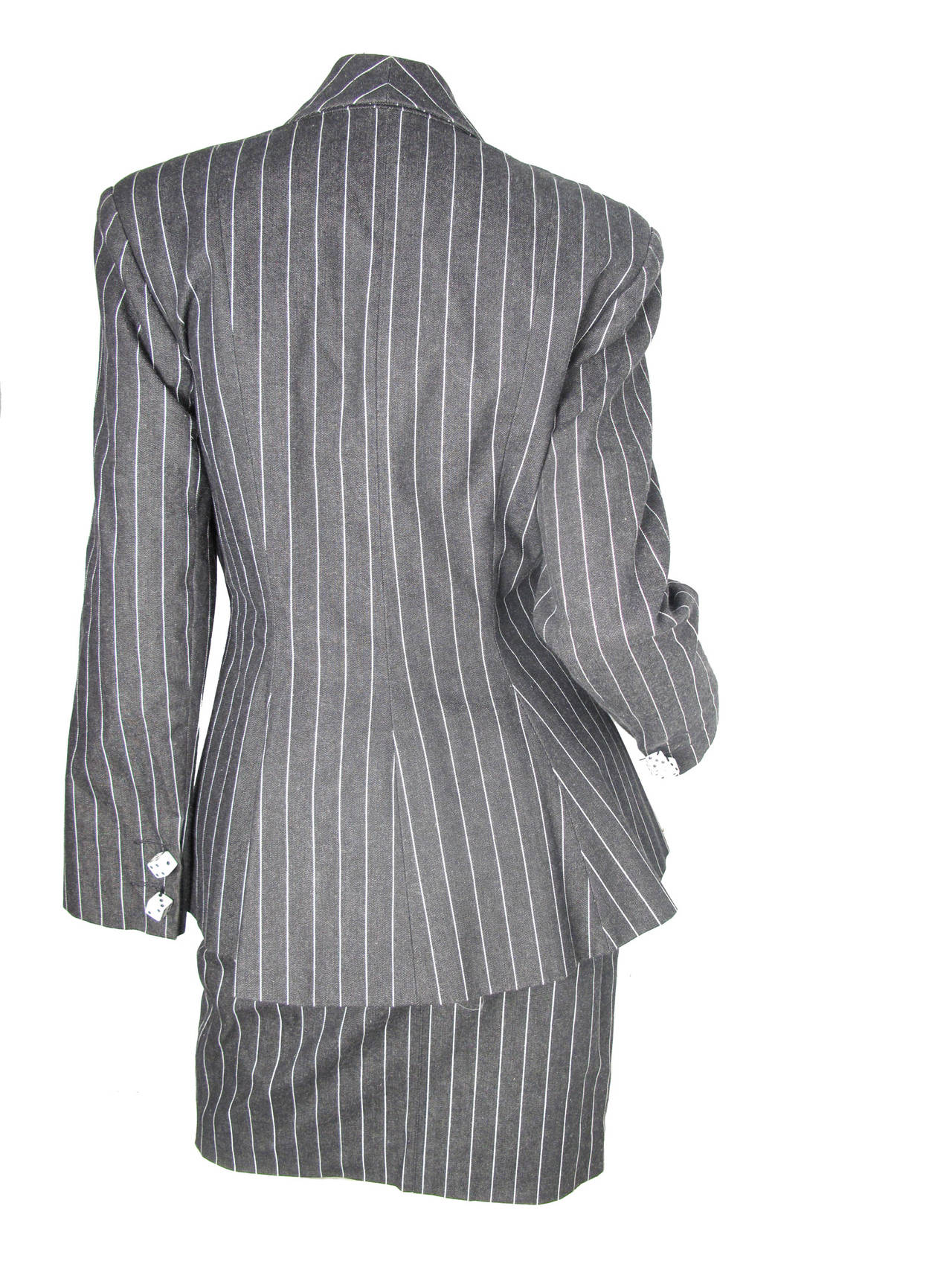 Rare Patrick Kelly grey cotton pinstriped suit with dice buttons and lining.  
Jacket: 36