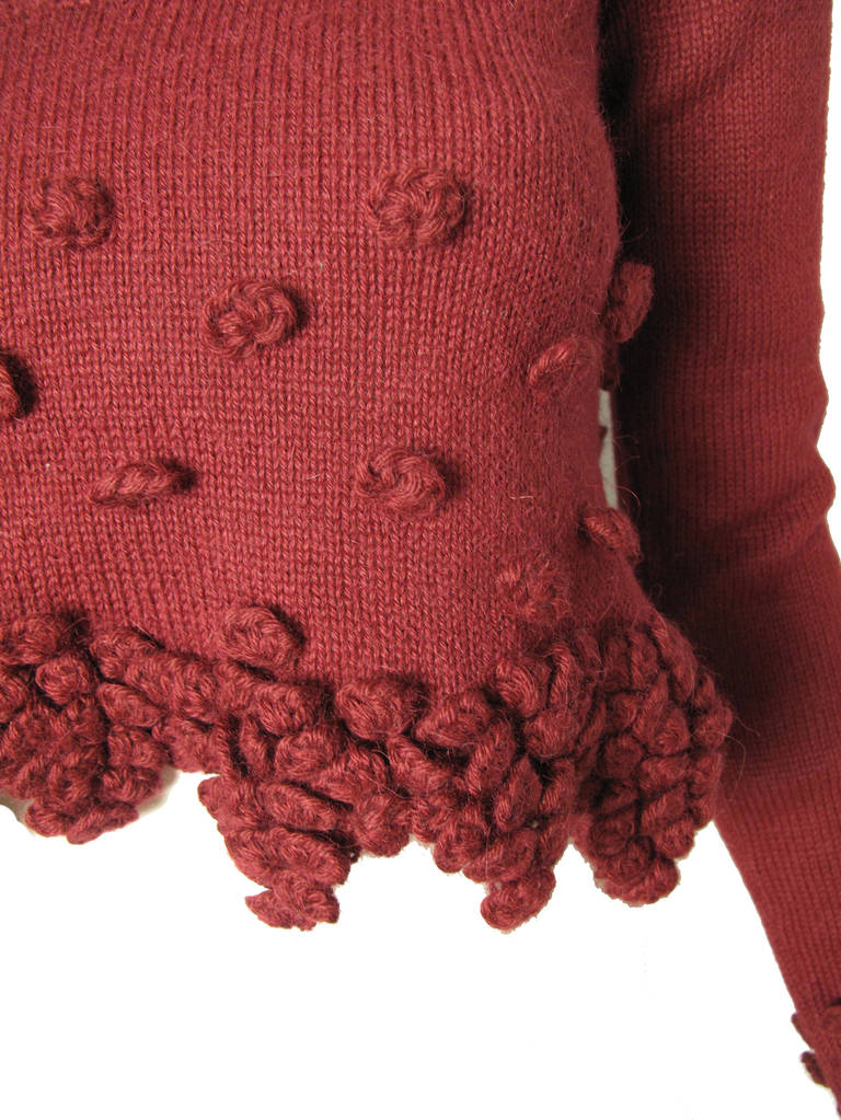 Romeo Gigli maroon v neck alpaca cropped sweater. 31" bust, 26 1/2" sleeve, 17 1/2" length. Condition: Excellent. Size S-M

We accept returns for refund, please see our terms.  We offer free ground shipping within the US. 

*this