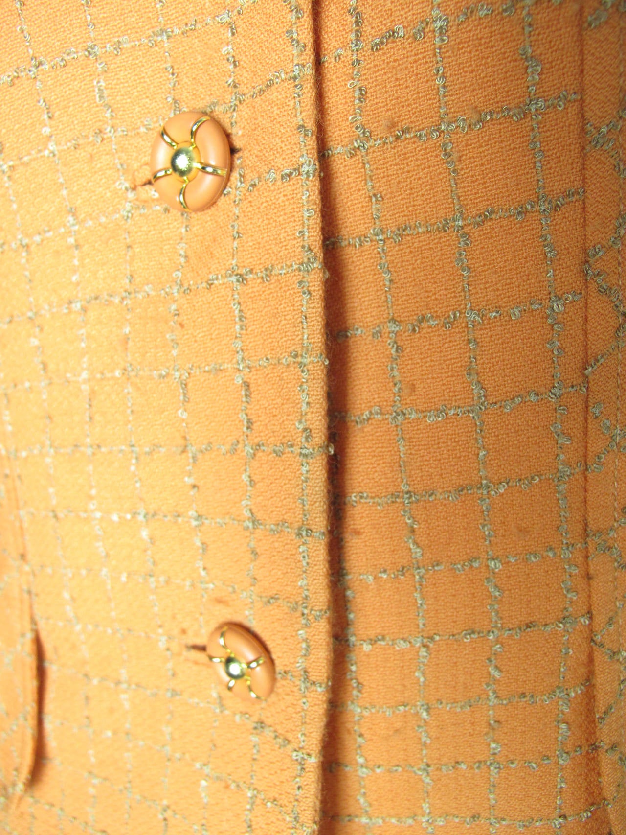 1970s Travilla orange and tan plaid suit. Condition: Very good. Size 10

Skirt: 30 