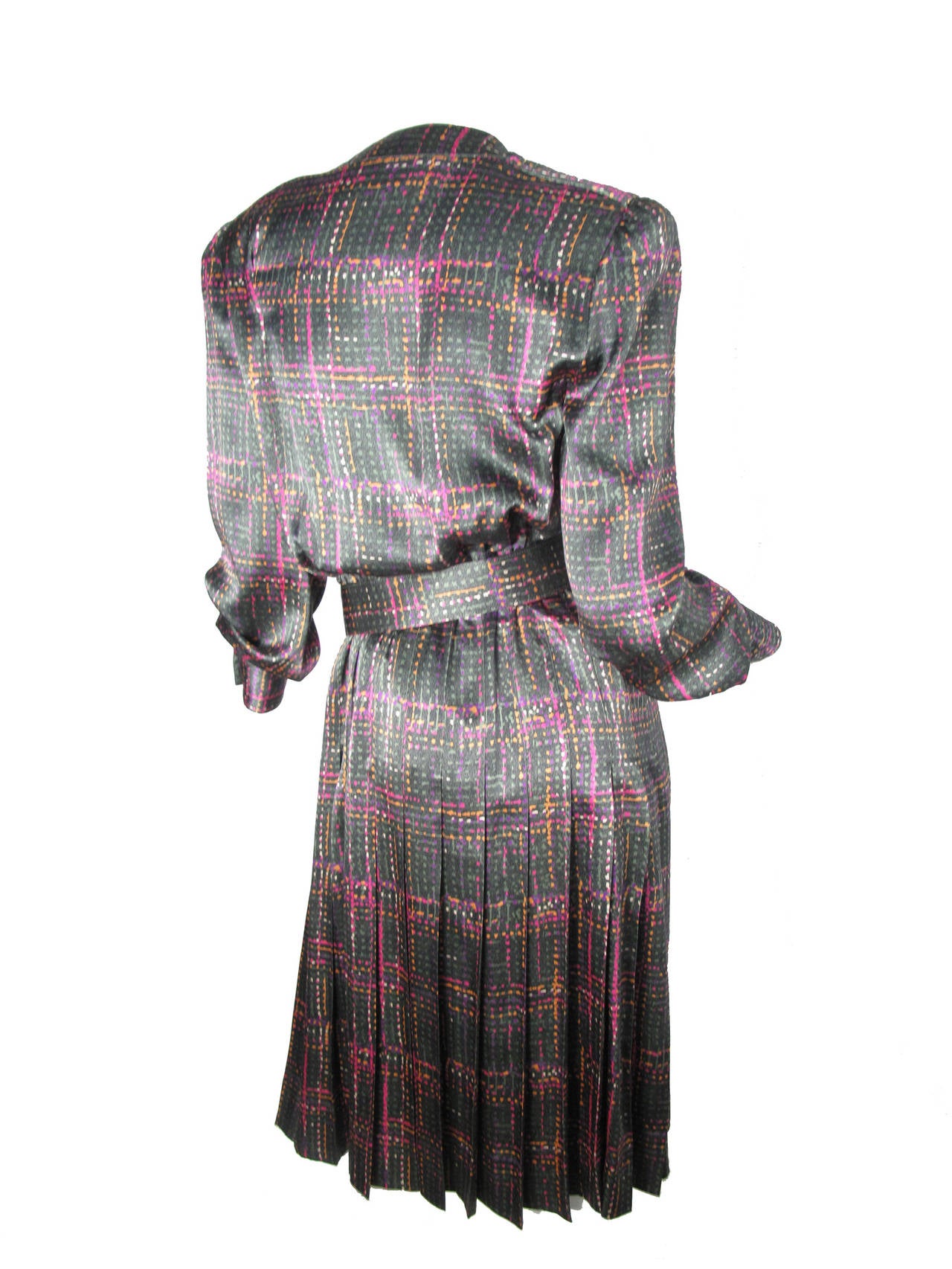 Adele Simpson printed silk dress with pleating.  Condition: Excellent. 
Size 8
38