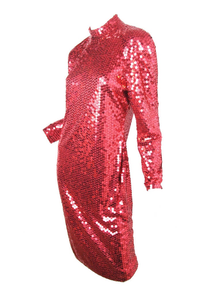 1980s Oleg Cassini red sequin evening dress with keyhole back. Condition: Very good, two sequins have come loose.  Size 10 - 12