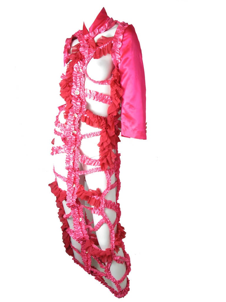 2008 Comme des Garcons hot pink ribbon cage dress.  Buttons down front.  Measurements taken un-stretched. 35