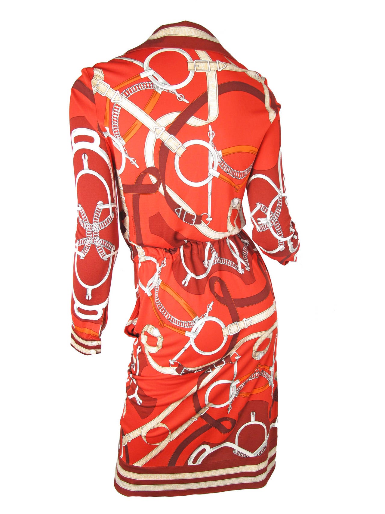 1970s- 1980s Hermes red silk jersey shirt dress with ties at waist and two side pockets. 34