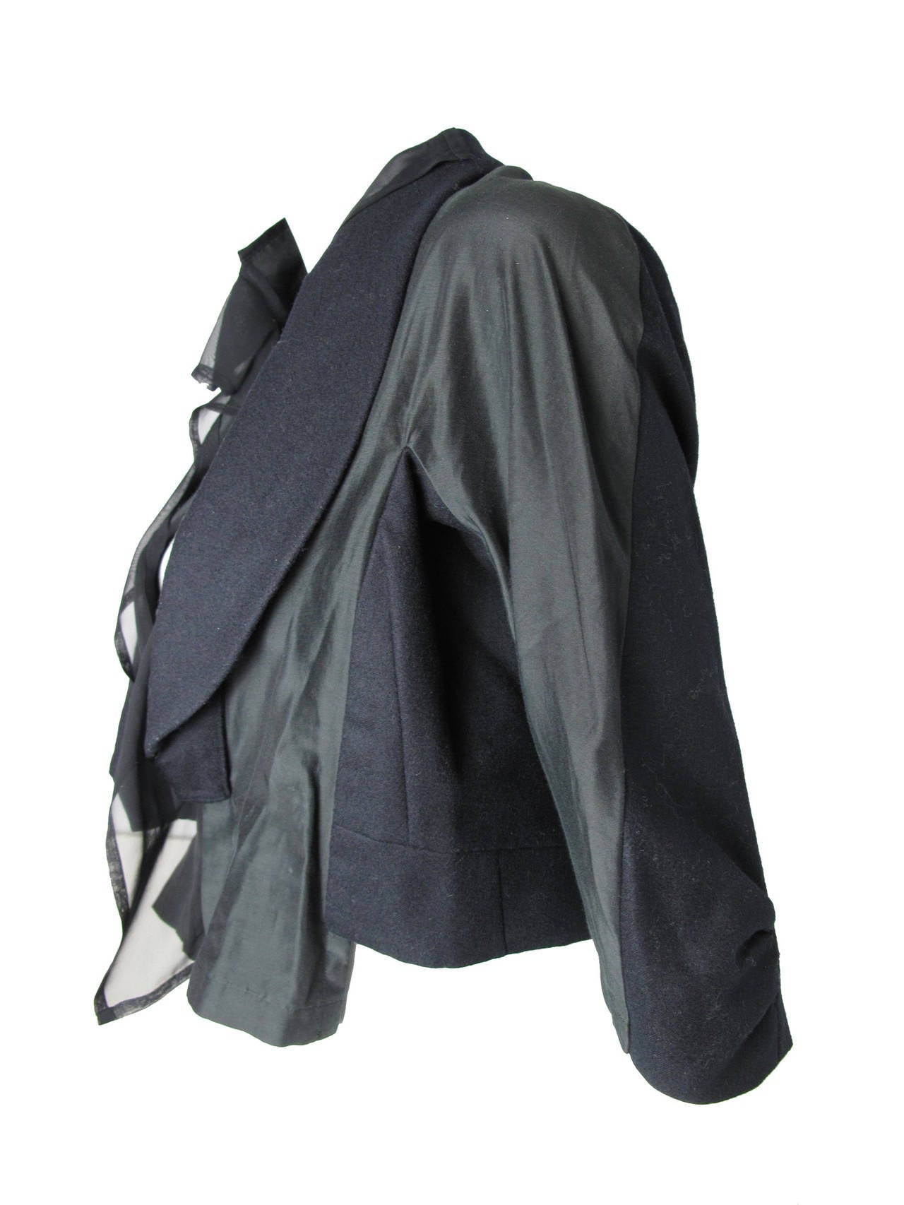 Comme des Garcons cropped jacket.  Condition: Excellent. Size M