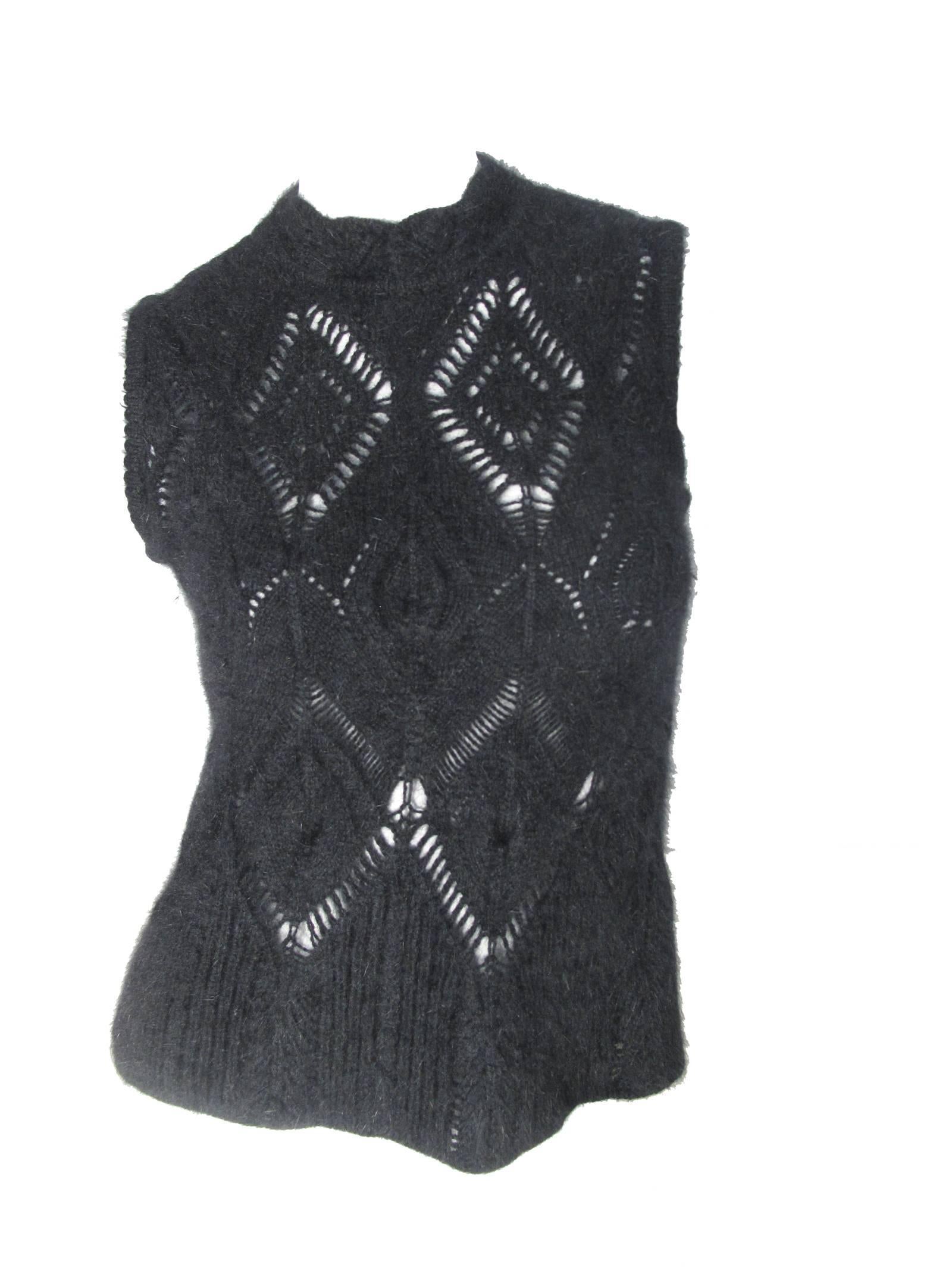 Christian Dior black angora knit cardigan and sleeveless top.  
Condition: Excellent. Size 6

Top: 34 