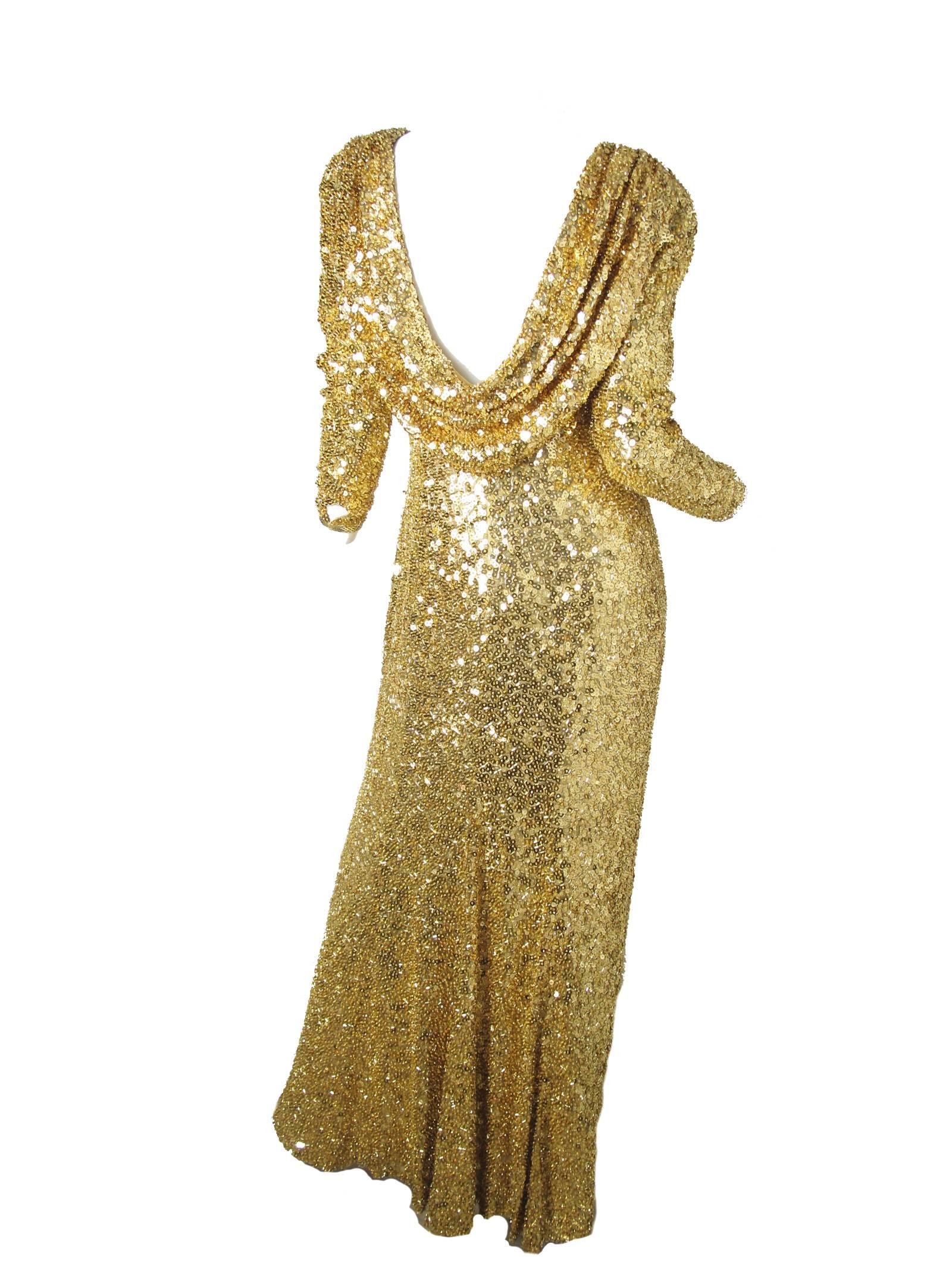 1980s Lillie Rubin gold sequin and beaded silk gown with drape on back.  Condition: fair vintage condition, multiple beads & sequins missing and stain on inside lining at chest, see photos.  Size 6 

We accept returns for refund, please see our