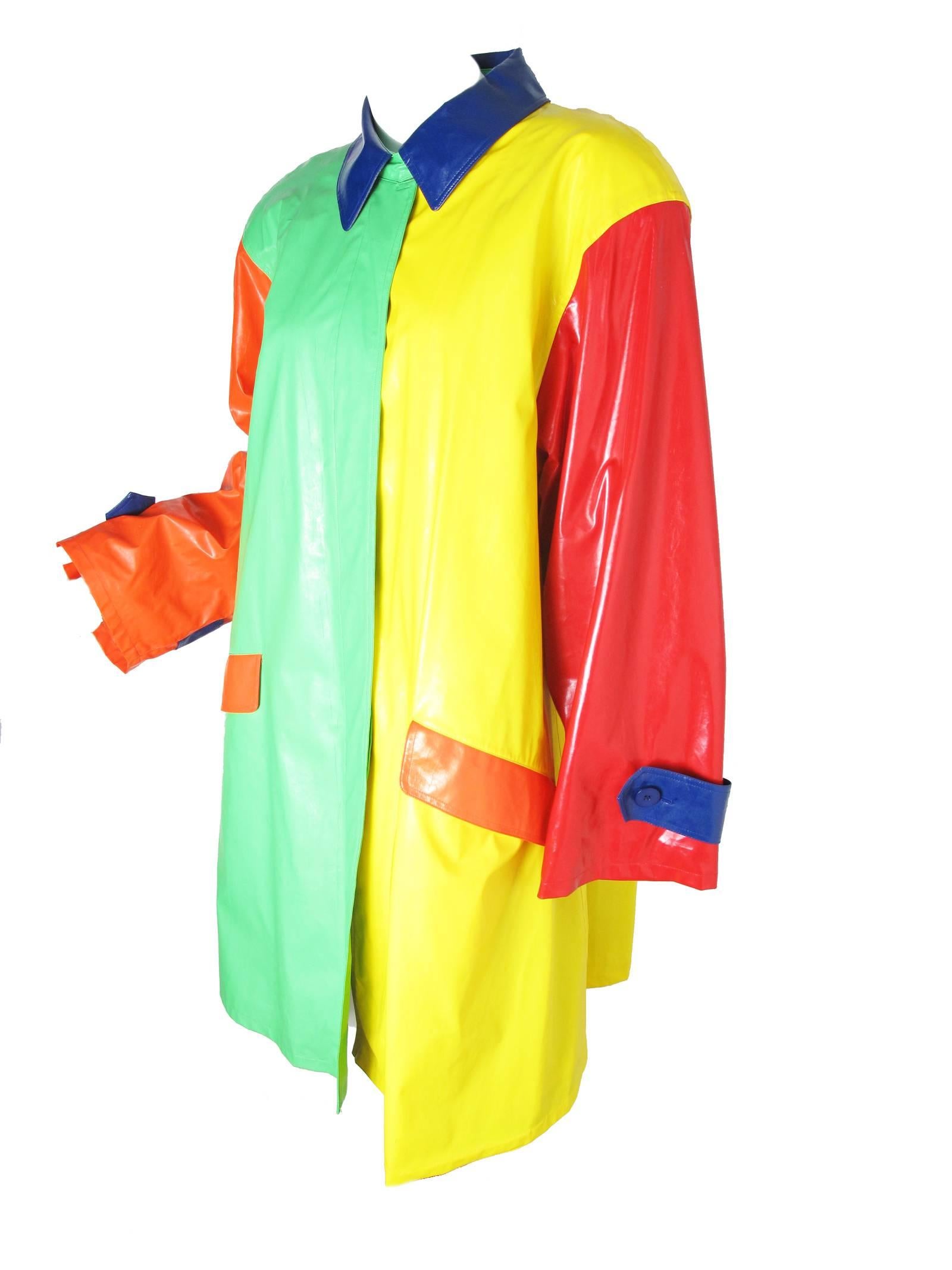 1970s Bill Blass primary colored raincoat.  Condition: AS IS, cracking to vinyl. Size 10

We accept returns for refund, please see our terms.  We offer free ground shipping within the US.  Please let us know if you have any questions.
