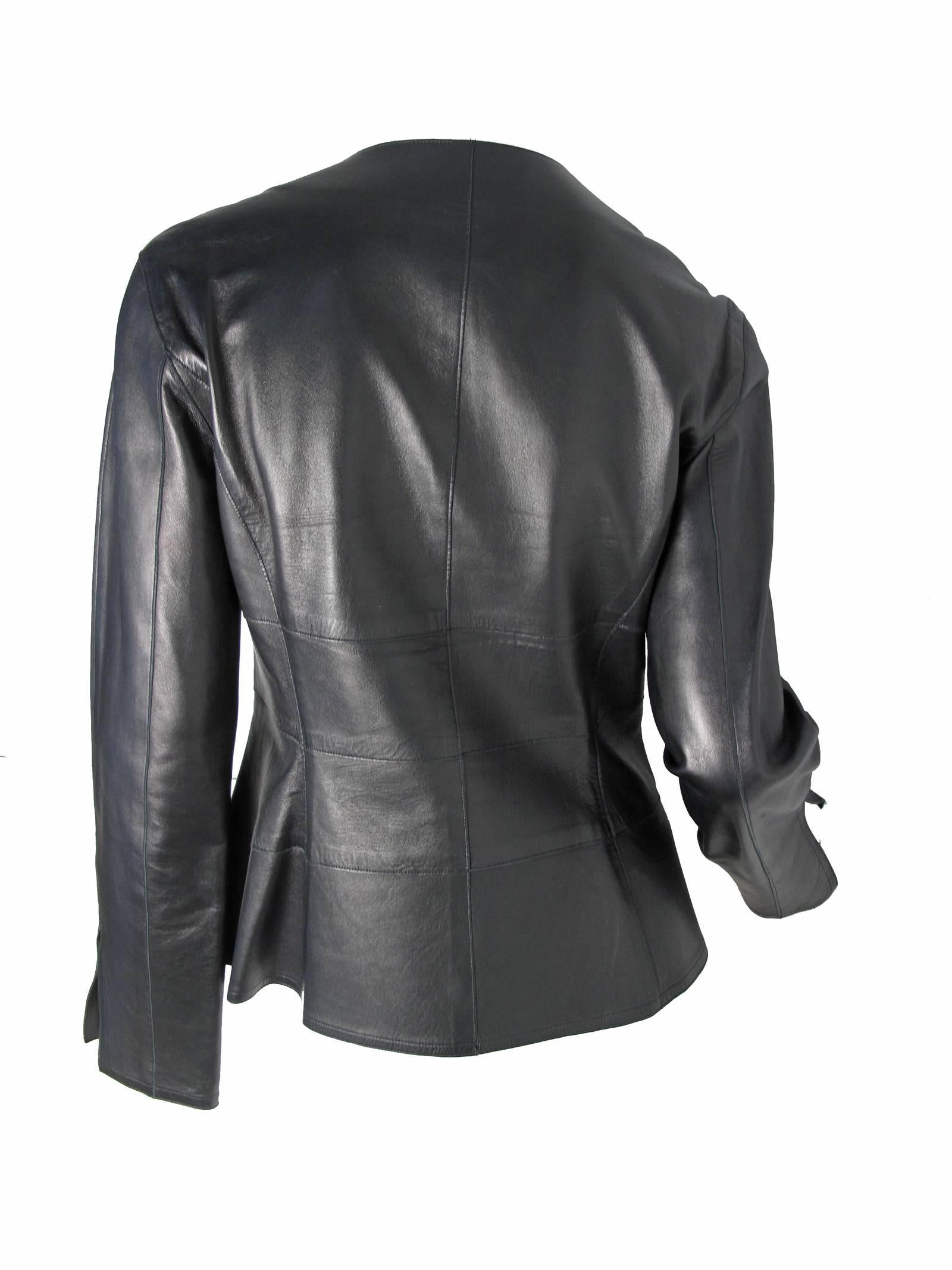 1999 Chanel black soft leather ( lambskin ) jacket with two front pockets. 