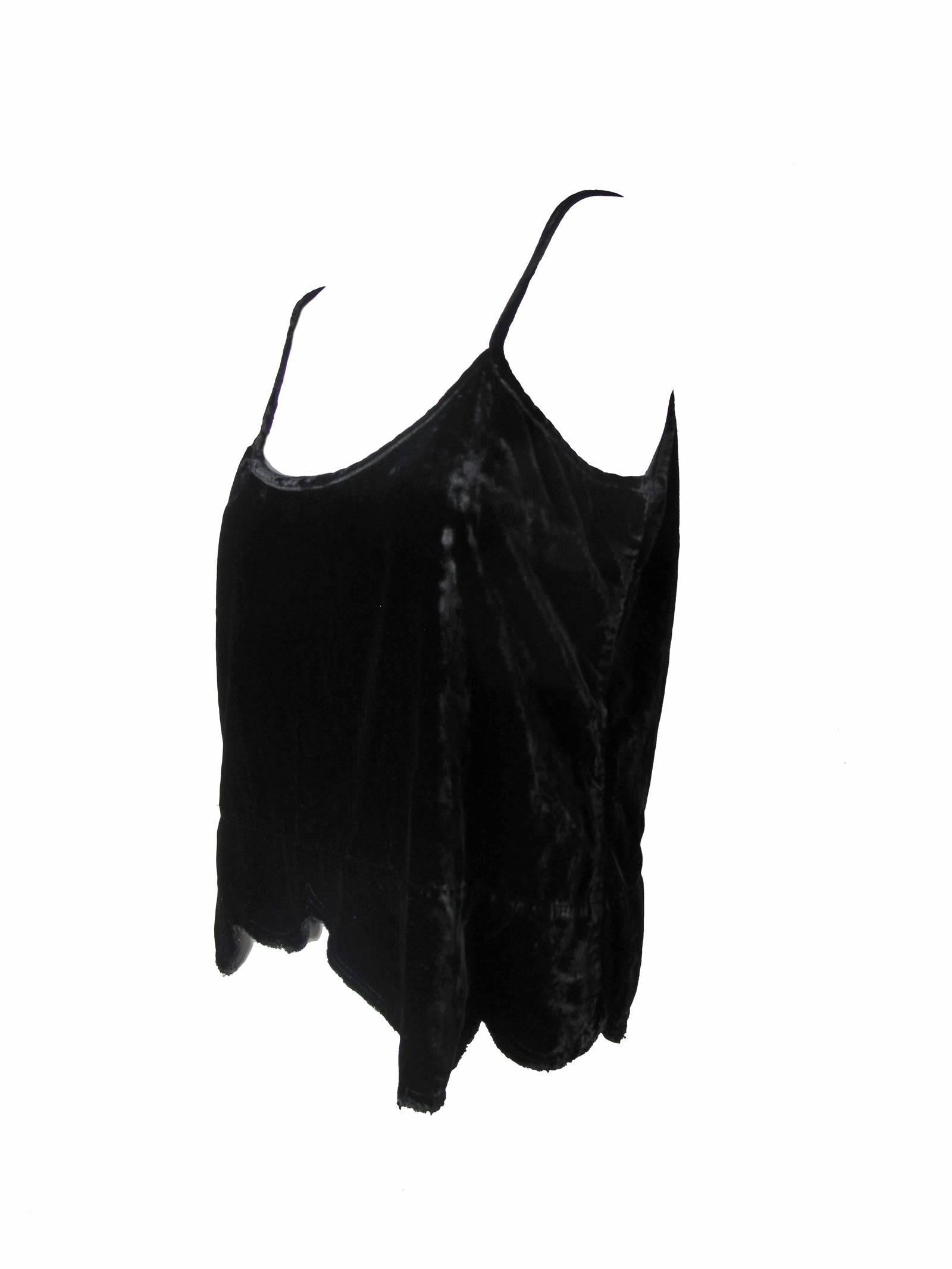 Comme des Garcons black velvet tank with distressed scalloped hem.  Zipper on side.  Condition: Excellent. Size L
37