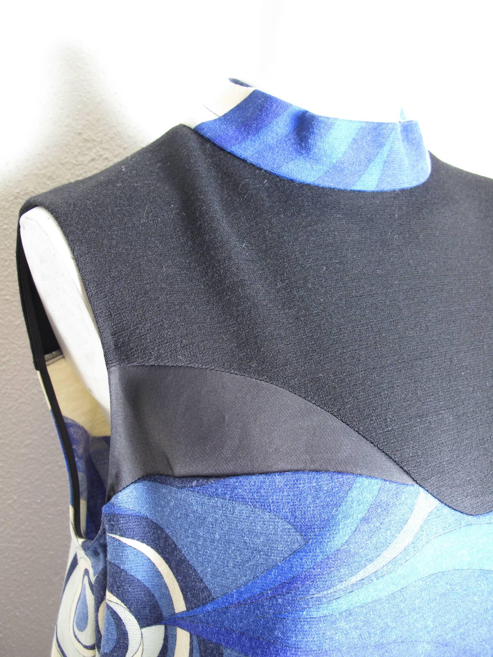 Pucci blue , off white, black wool sleeveless dress with black sheer panels. Condition: Excellent. Size 12