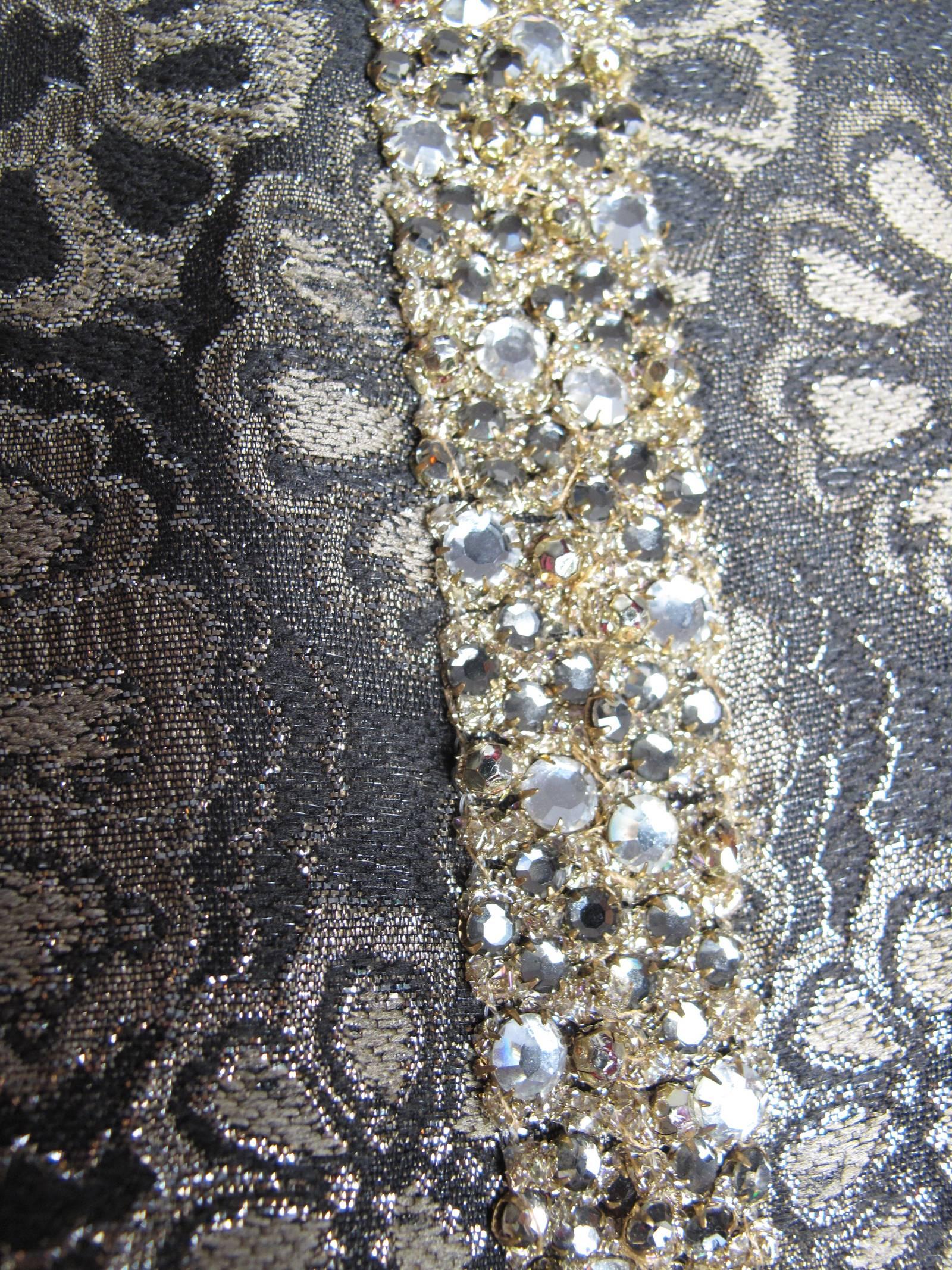 Adele Simpson brocade and rhinestone dress.  Condition: Very good, some brocade coming undone at cuffs.  Size 8

39