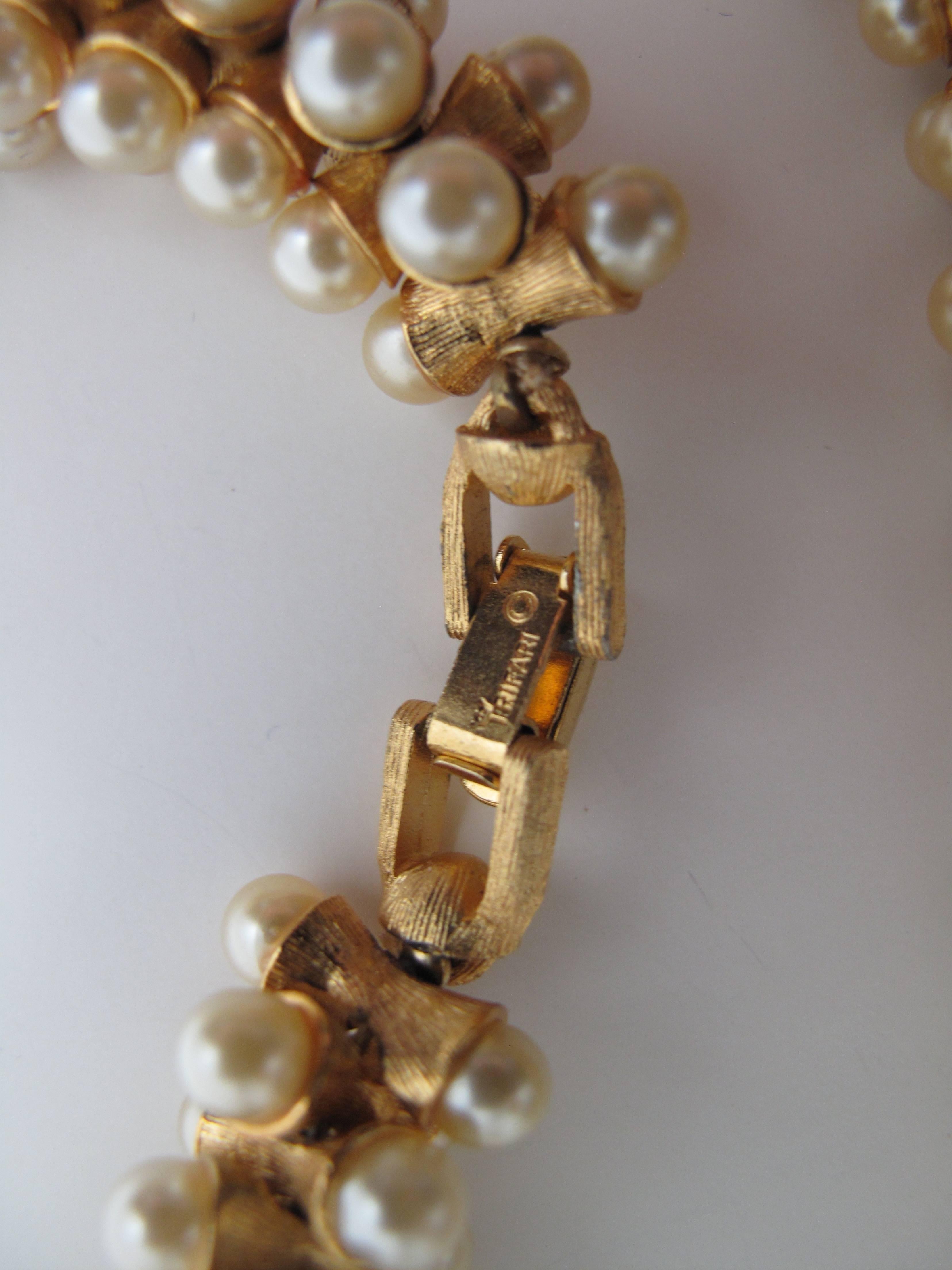1960s Trifari faux pearl and gold tone heavy necklace.  Condition: Excellent.  29