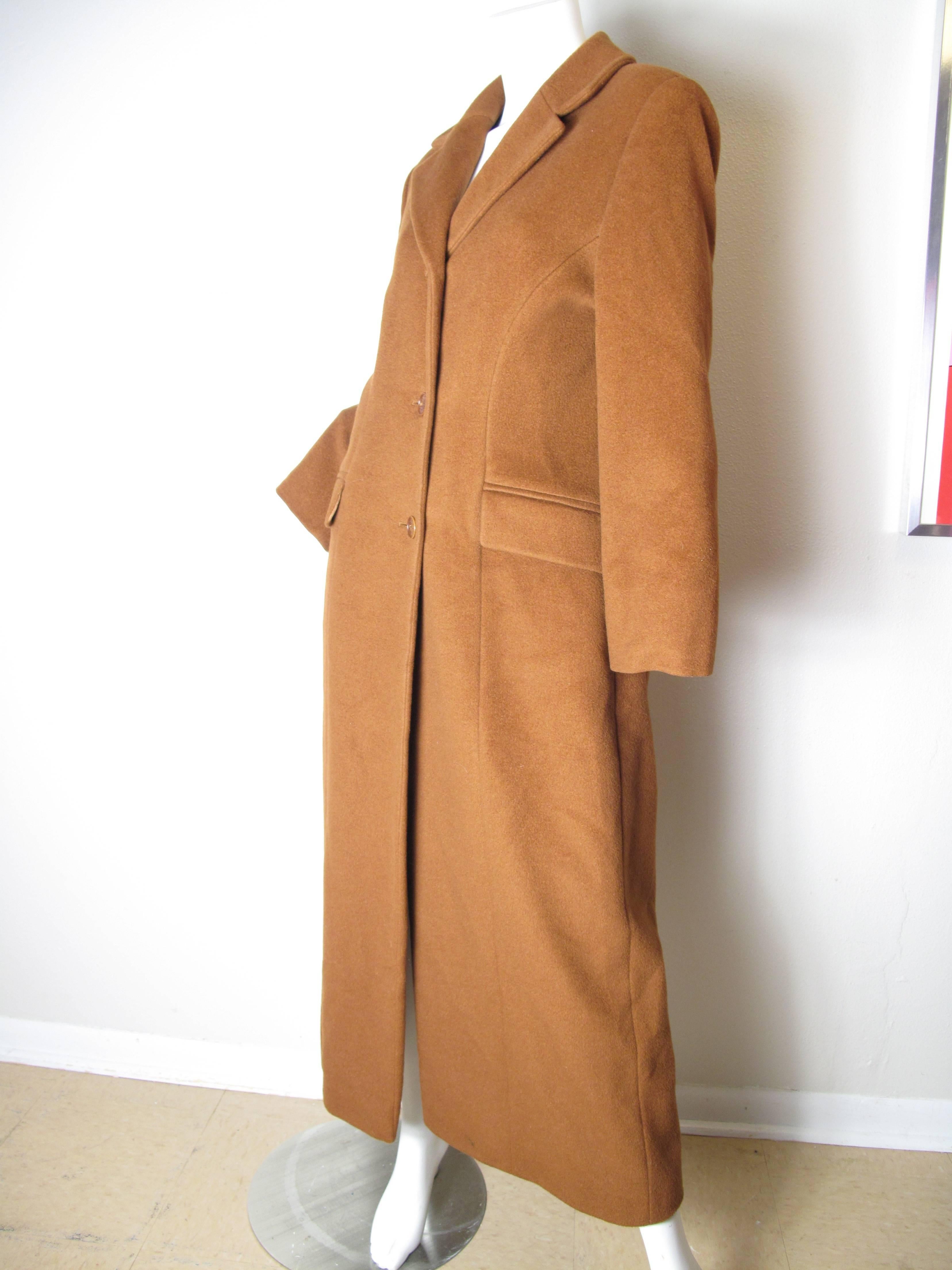 Gorgeous Guy Laroche Brown Wool Coat. Two front pockets, buttons down front. Condition: Excellent. Size 42/ US 8  ( mannequin is size 6 )

We accept returns for refund, please see our terms.  We offer free ground shipping within the US