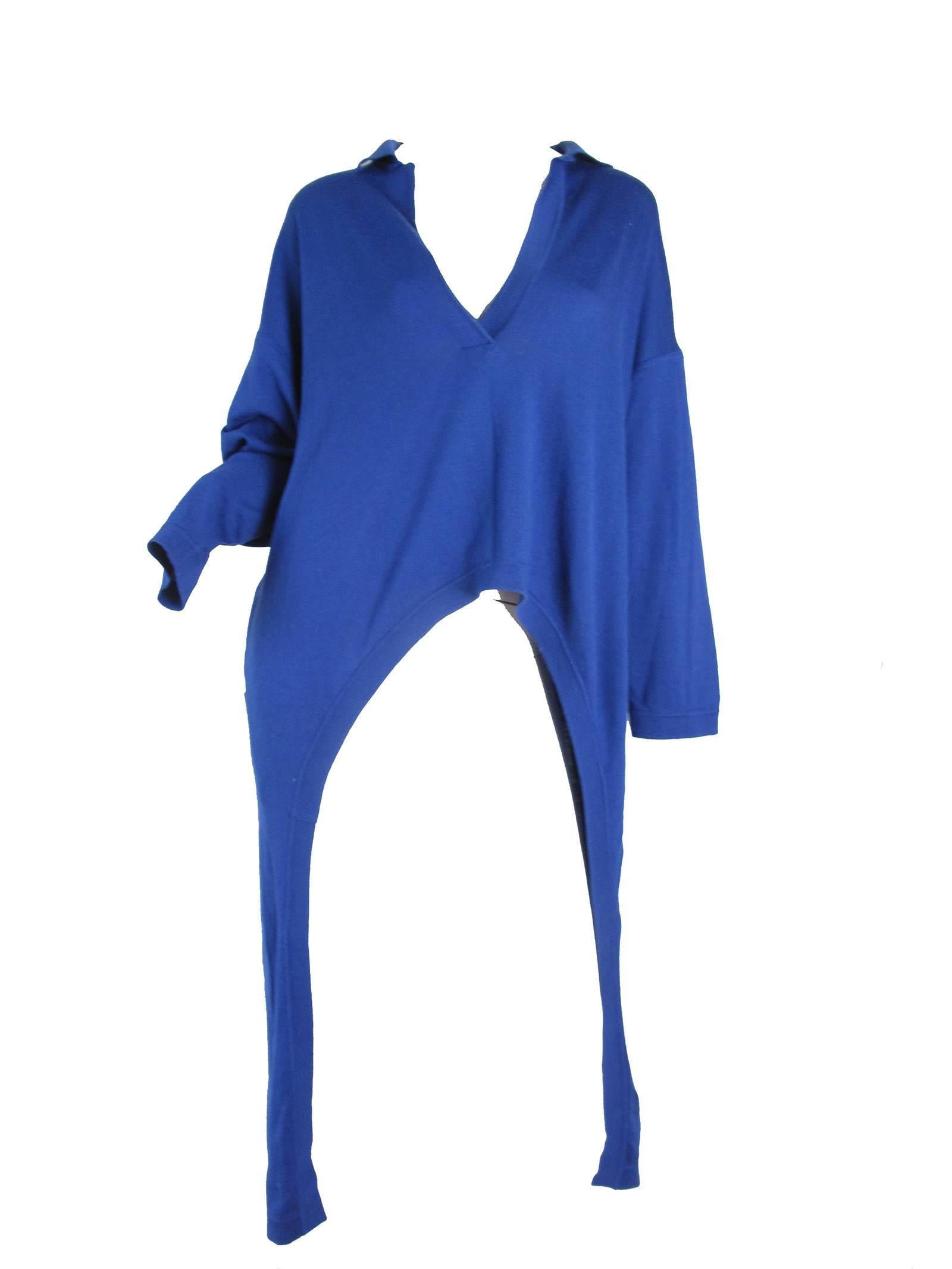 Oversized blue Italian sweater with tails.  condition: Excellent. No label. Size 40 ( mannequin is a US size 6)

We accept returns for refund, please see our terms.  We offer free ground shipping within the US
