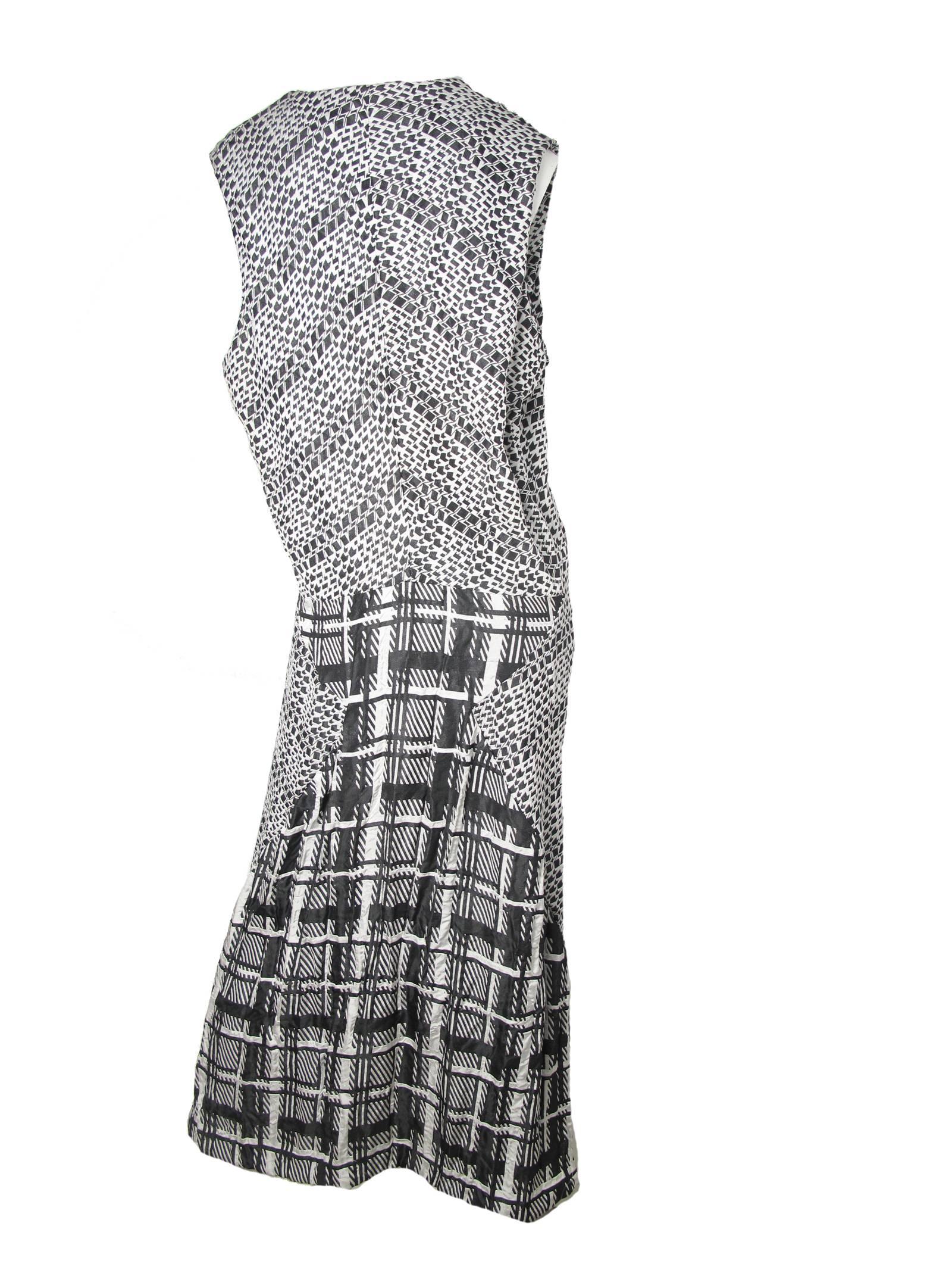 1992 Comme des Garcons arrow / star printed gown, never worn, original tags still attached. 
44