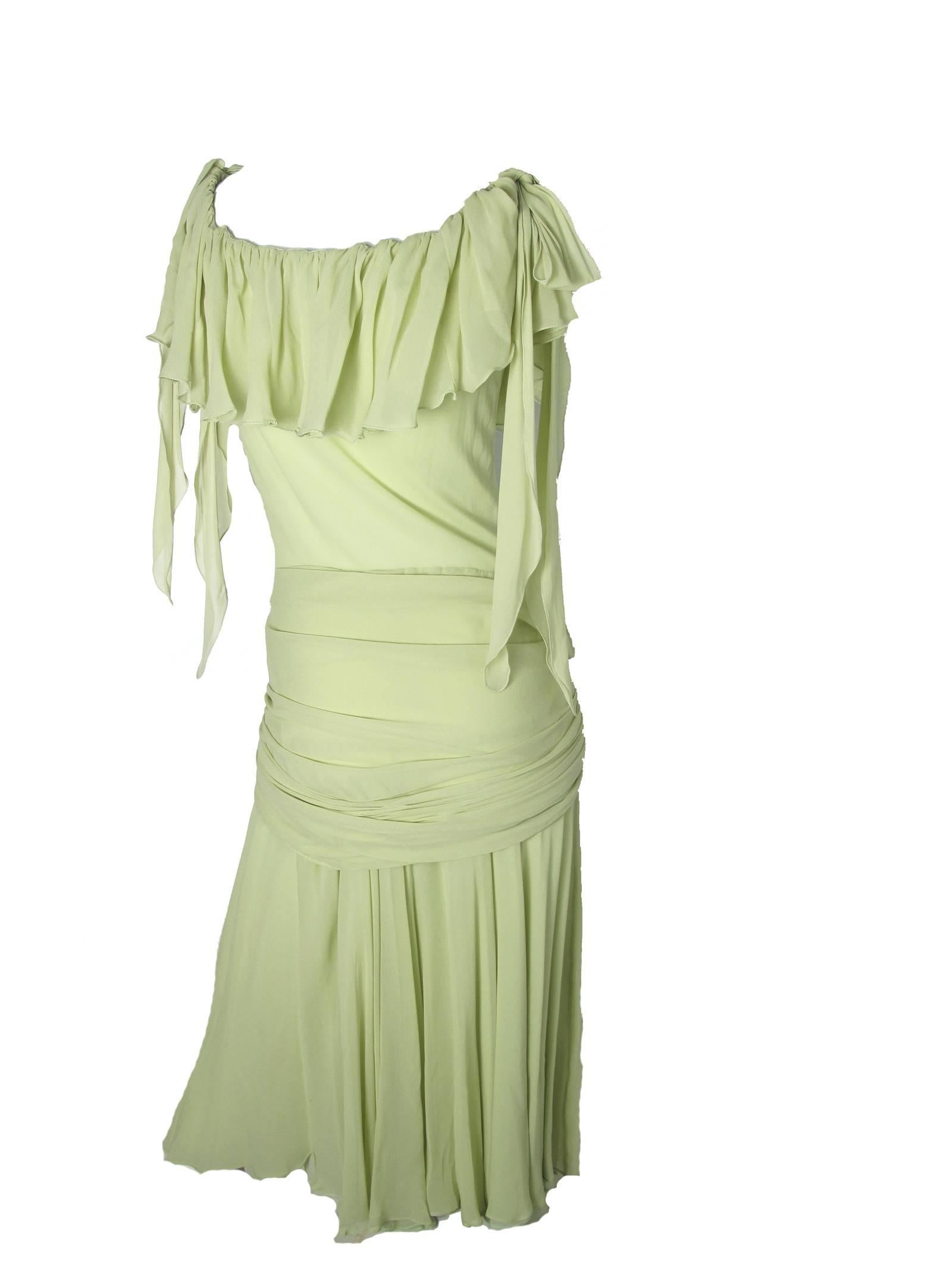 Moschino Couture light green silk chiffon dress with ties on shoulders and at waist. Condition: Very good, few light spots 
Size 8 

33