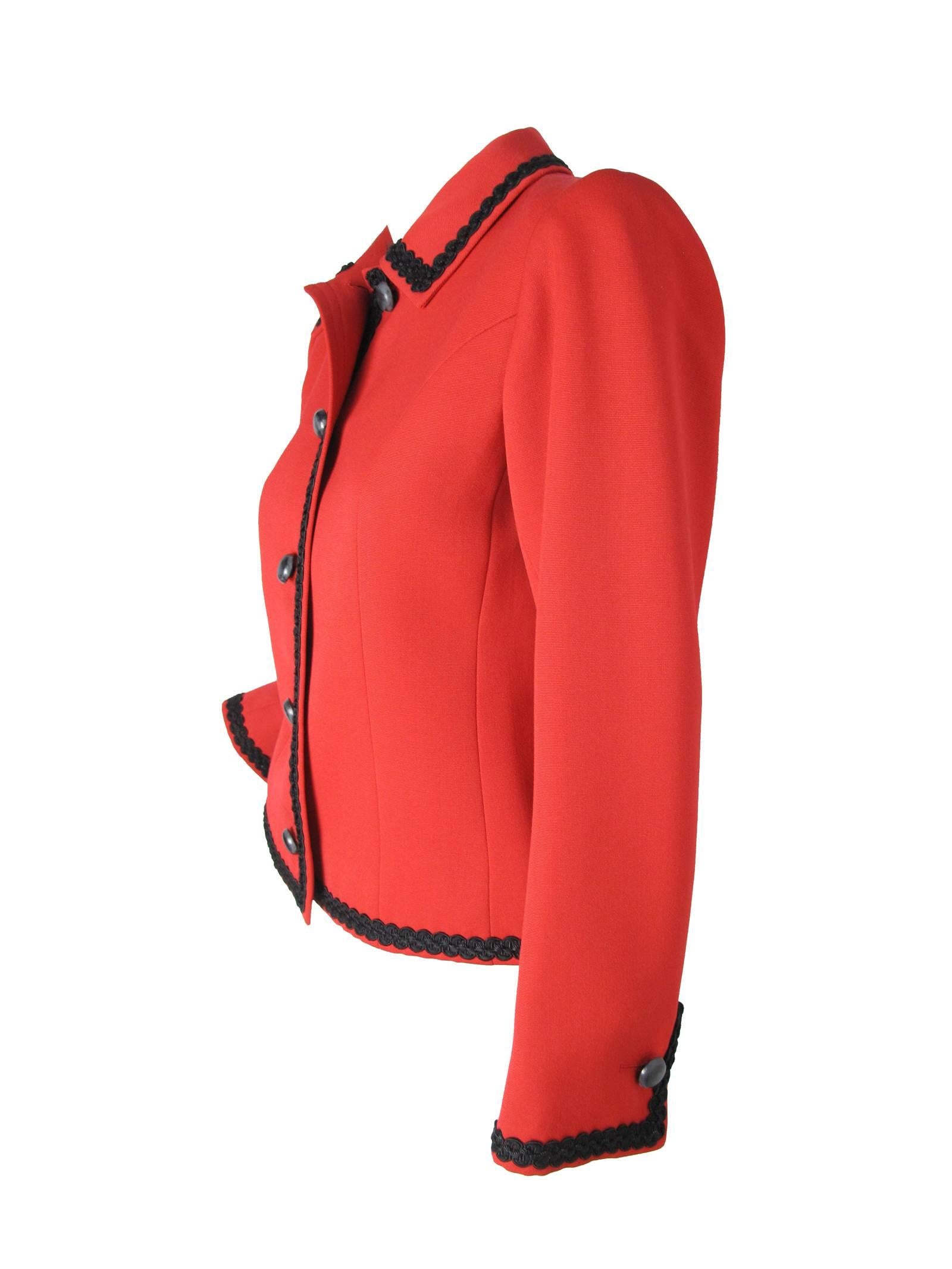 Yves Saint Laurent red wool jacket with black trim.  Condition: good, small spots on front under buttons and some on front by buttons, see photos. 38