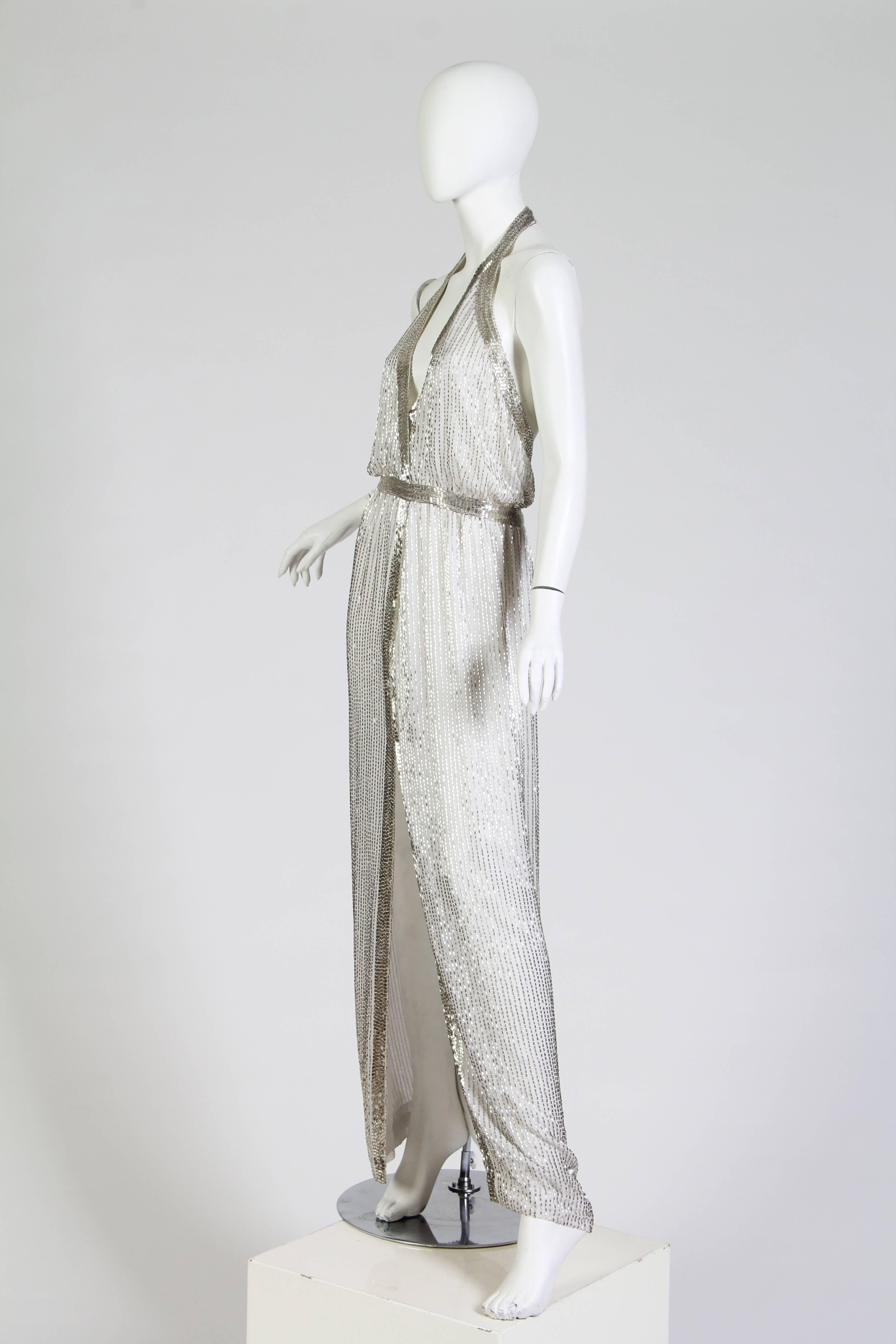 Backless 1970s Heavily Beaded Gown with Plunging V and High Slit very Halston but no label. 