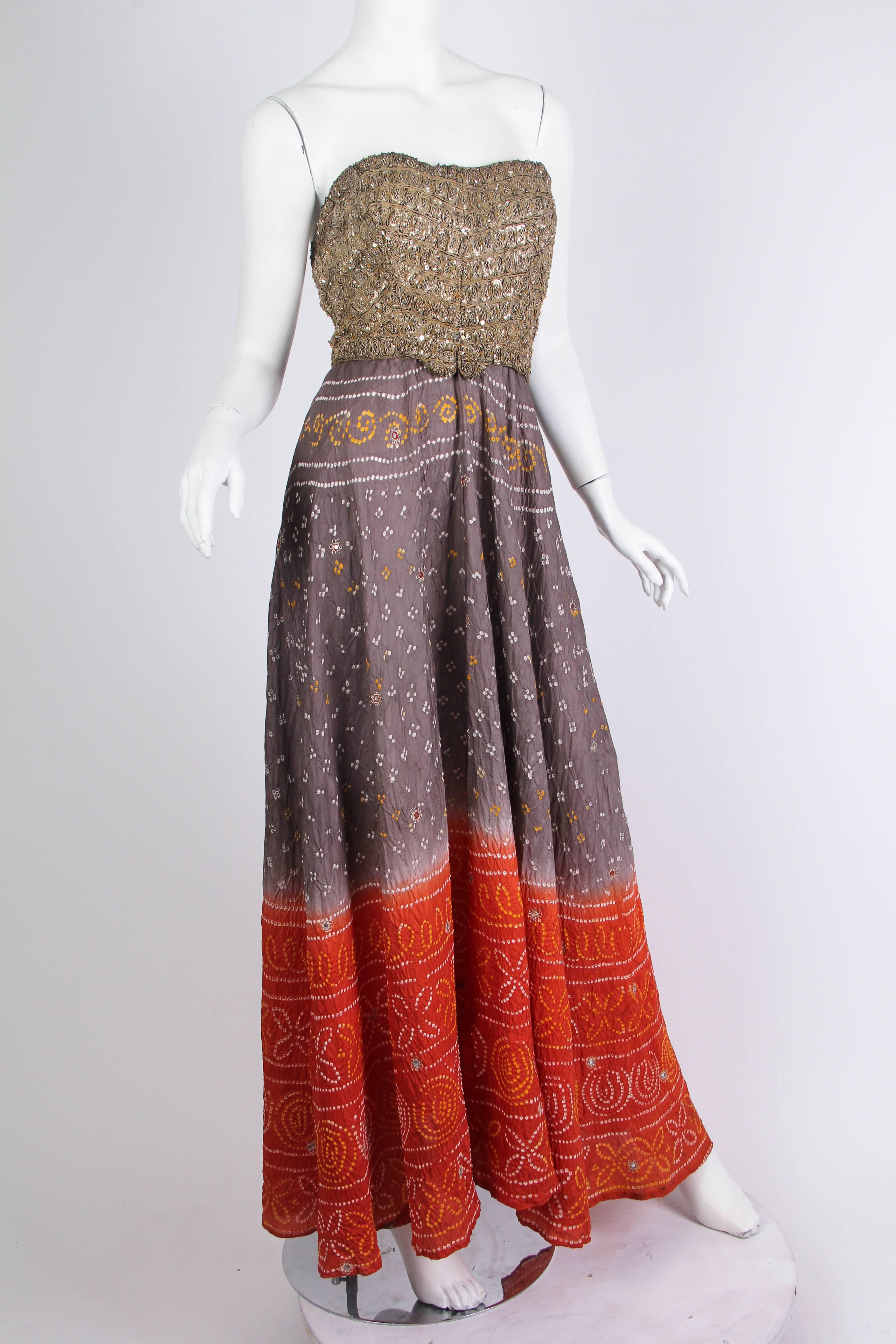 MORPHEW COLLECTION Hand Dyed Shibori Silk & Metalilc Gold Indian Embroidered Strapless Gown
MORPHEW COLLECTION is made entirely by hand in our NYC Ateliér of rare antique materials sourced from around the globe. Our sustainable vintage materials