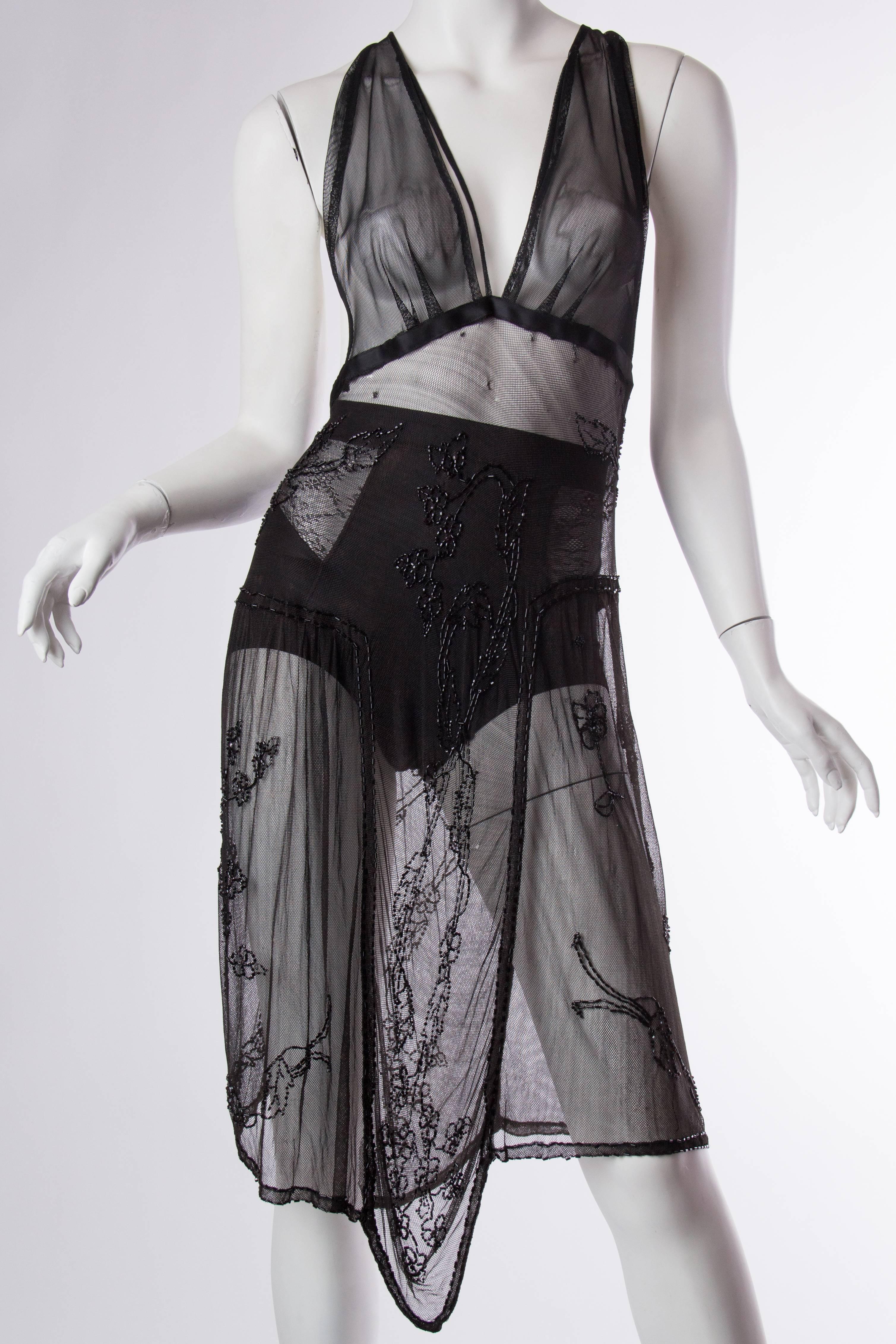 MORPHEW COLLECTION Black Hand Beaded Silk Tulle Sheer Dress Made W/ Edwardian Lace From 1910
MORPHEW COLLECTION is made entirely by hand in our NYC Ateliér of rare antique materials sourced from around the globe. Our sustainable vintage materials